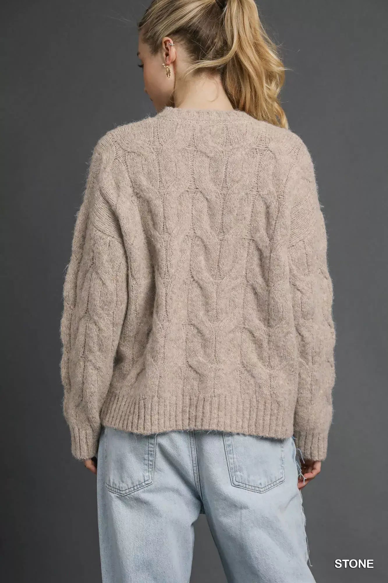 Umgee Cable Knit Cozy Sweater in stone color, showcasing intricate back cable knit design and relaxed fit.