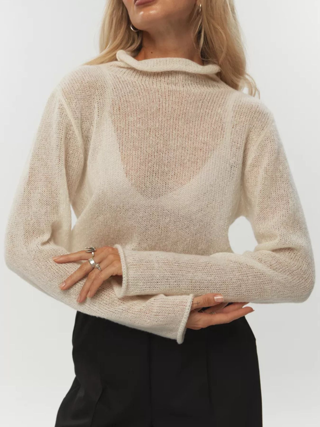 Mock Neck Long Sleeve Sweater in cream color, featuring a cozy design and stylish fit for women's casual wear.