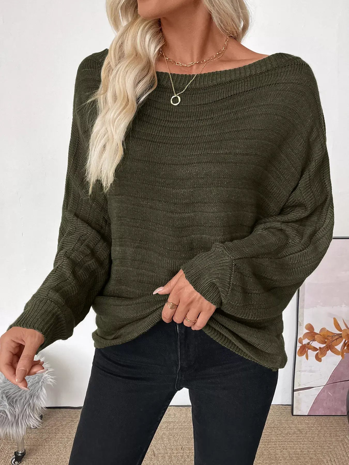 Boat Neck Ribbed Long Sleeve Sweater in dark green worn with black jeans for a chic everyday outfit.
