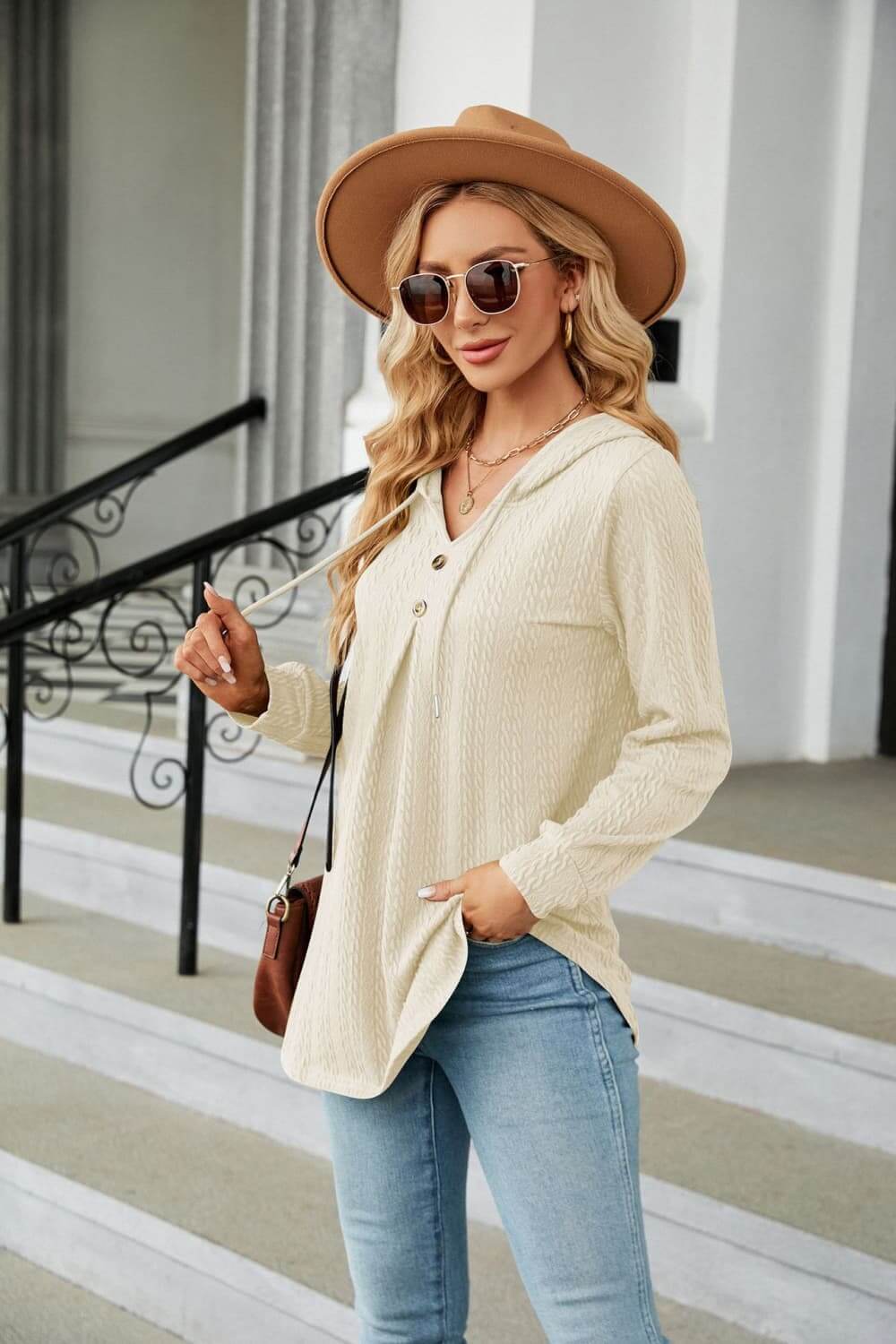 Long Sleeve Hooded Blouse styled with a hat and sunglasses, showcasing casual and cozy outfit for everyday wear.