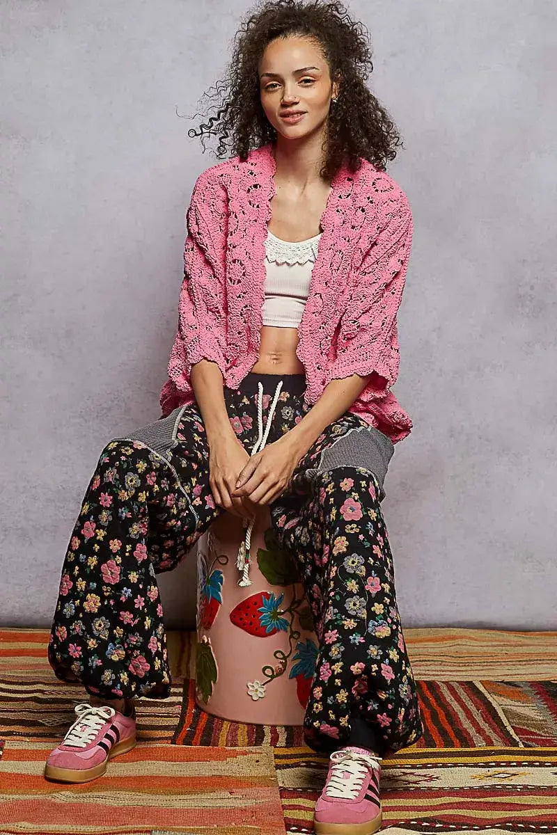 Model wearing POL Floral Pattern Open Front Cardigan with V-Neck, stylishly paired with floral pants.