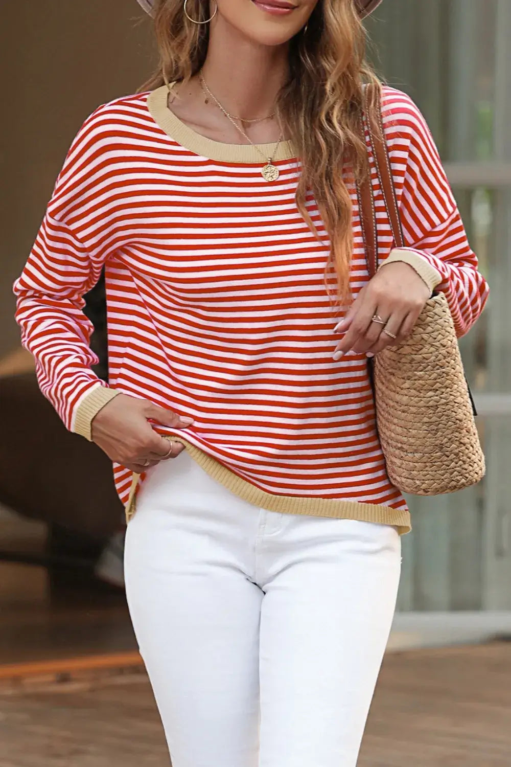 Striped Round Neck Drop Shoulder T-Shirt in red and white worn with white jeans and a straw bag.