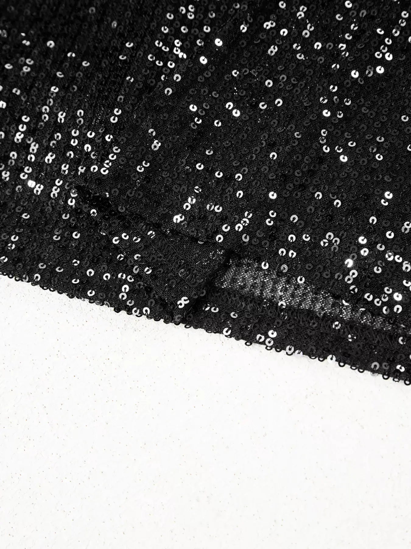 Sequin Mock Neck Drape Open Back Bell Sleeve Top showcasing shimmering sequins and elegant fabric details.