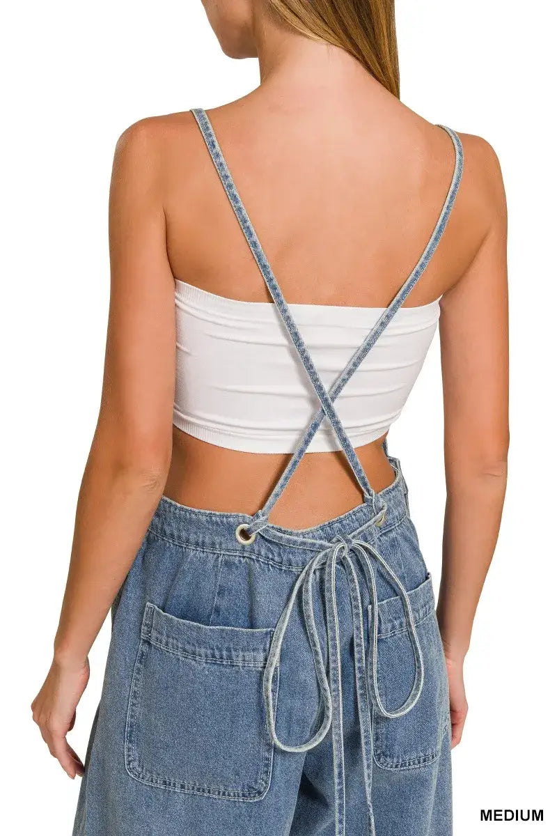 Back view of woman wearing Zenana Denim Wide Leg Overalls, showcasing adjustable straps and relaxed fit in medium wash.