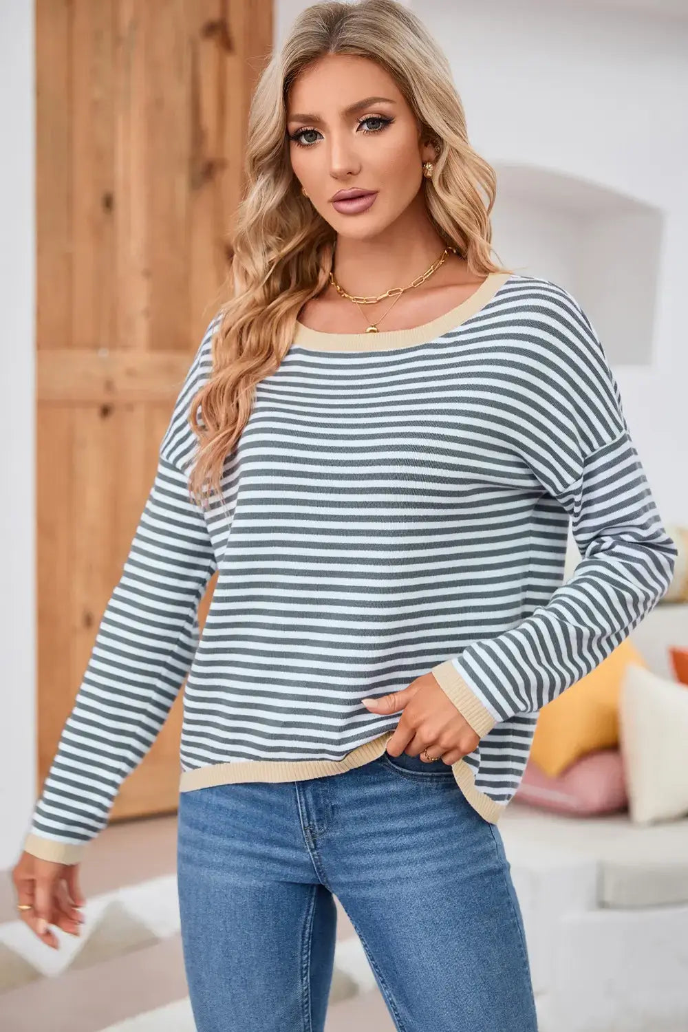 Striped Round Neck Drop Shoulder T-Shirt in blue and white stripes, styled casually with jeans.