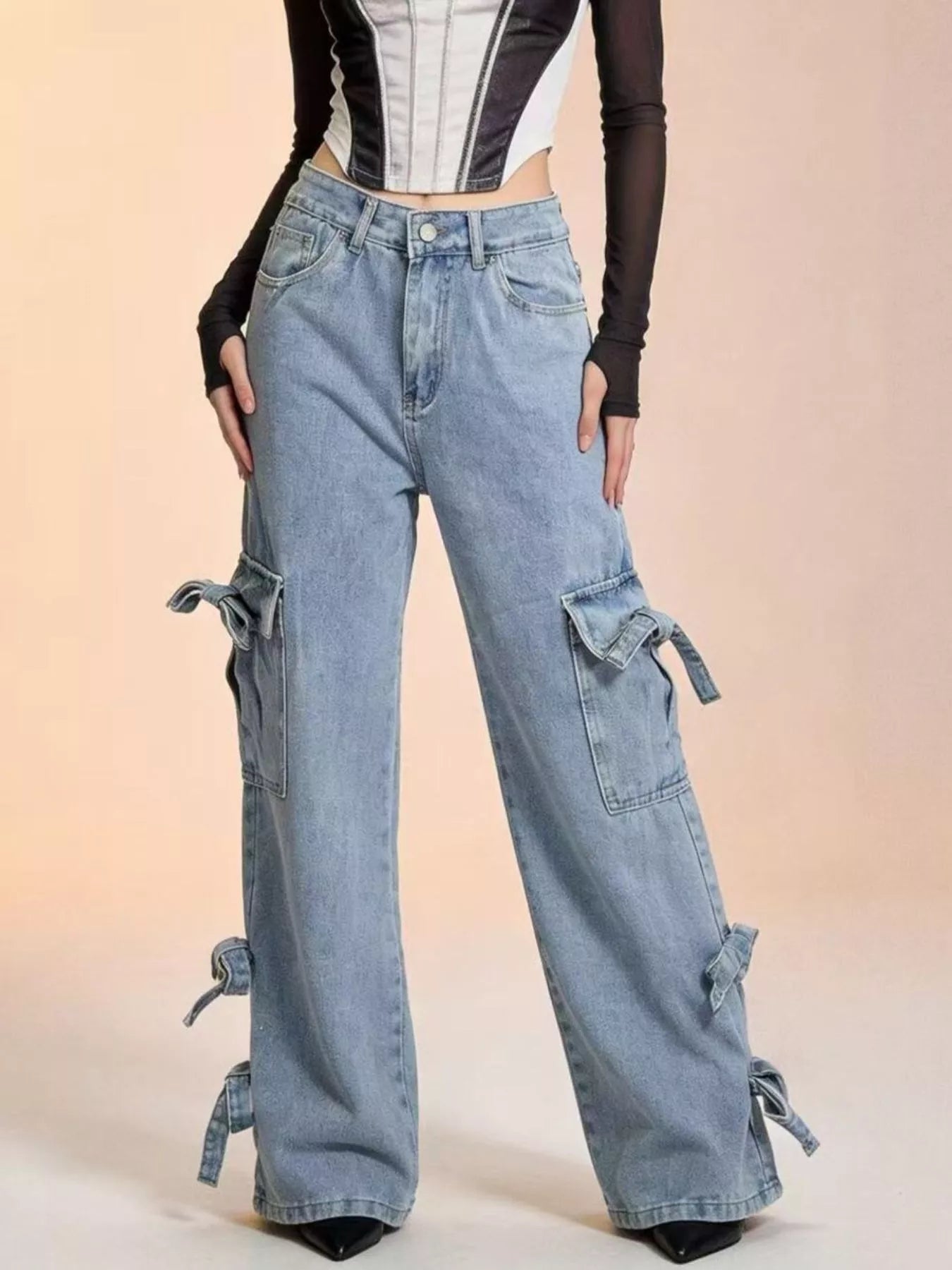 Bow Wide Leg Jeans with Pocketed Detail and Relaxed Fit, featuring stylish bow accents and a comfortable fit.