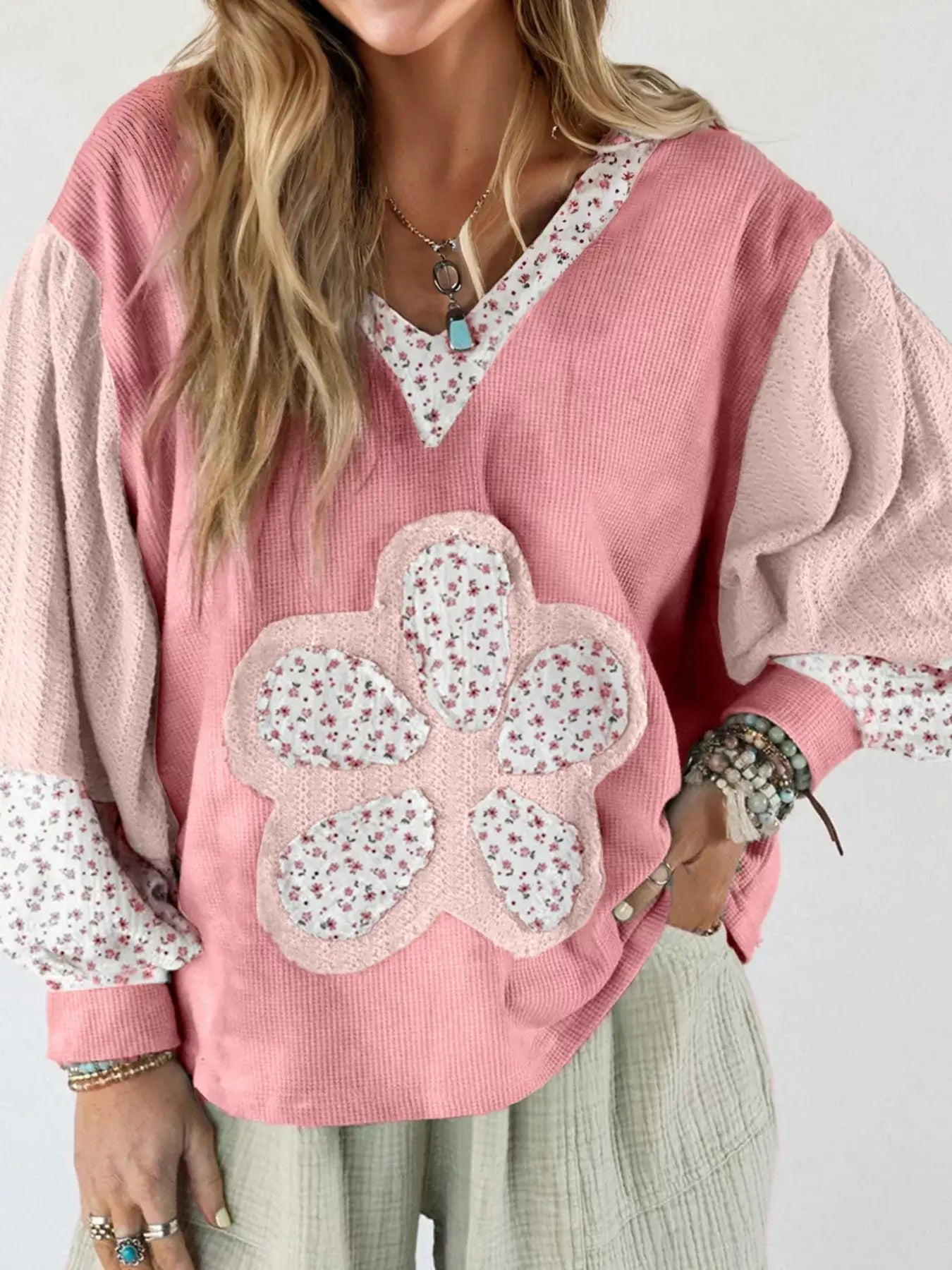 Floral Patch V-Neck Sweatshirt in pink with oversized fit and floral accent detail, perfect for casual layering.