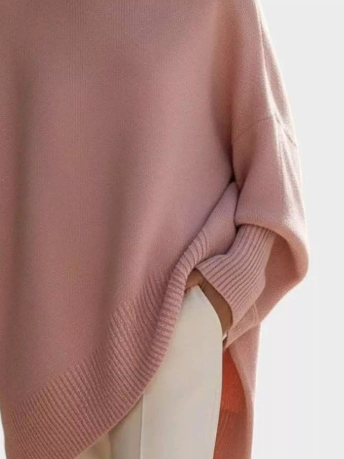 Oversized Batwing Sleeve Knit Sweater for Women in soft pink with ribbed detailing and slightly oversized fit.