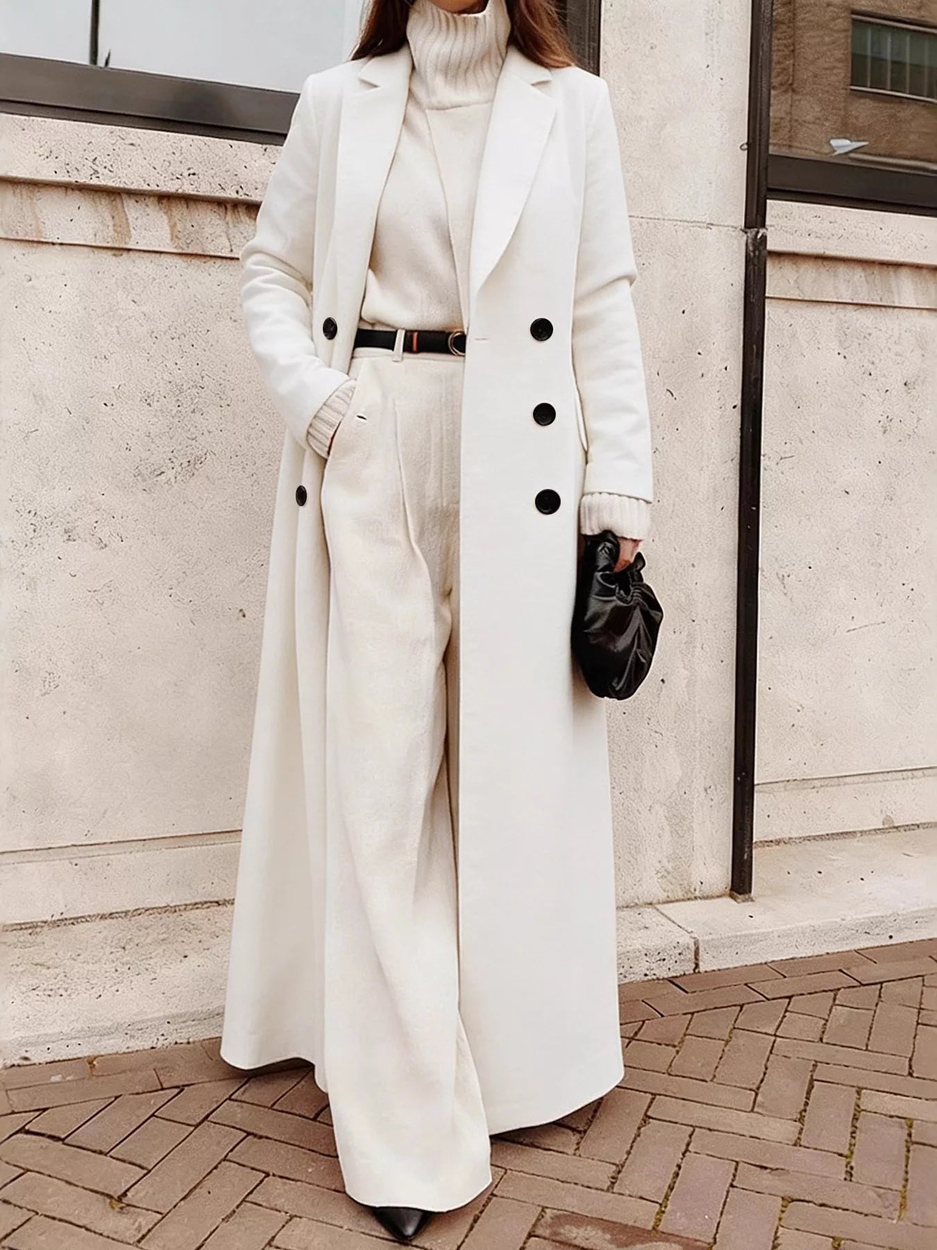 Double Breasted Longline Overcoat worn with matching outfit, featuring elegant style and chic accessories, perfect for fashion-forward looks.
