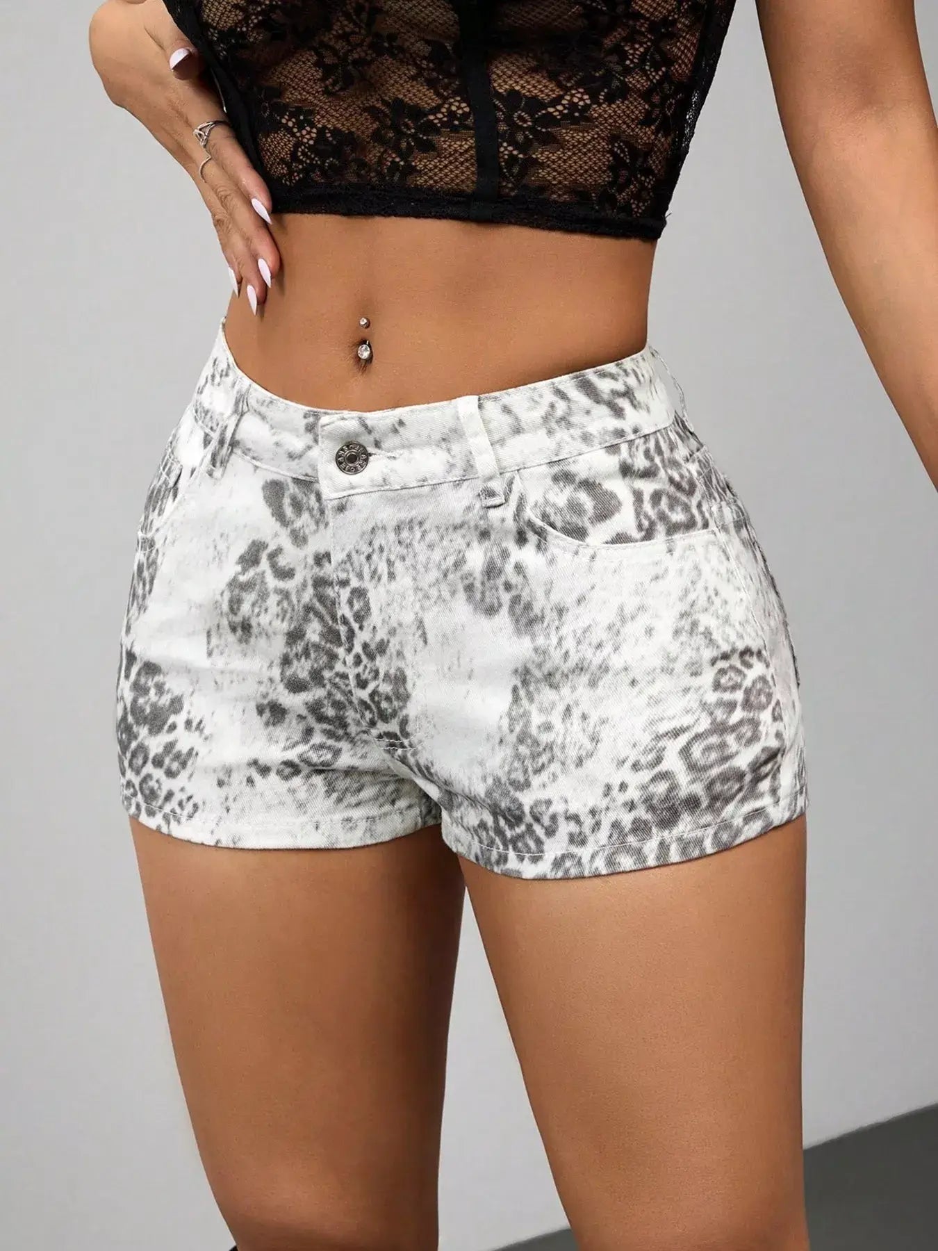 Leopard print denim shorts for women, perfect for summer outfits and casual outings.