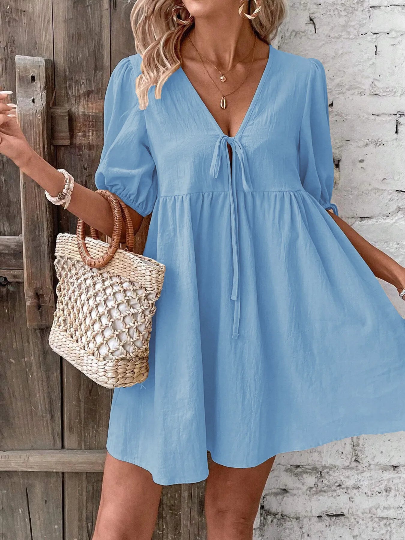 V-Neck Tie-Front Mini Dress with Puff Sleeves in light blue, featuring a tie-front detail and casual summer style.