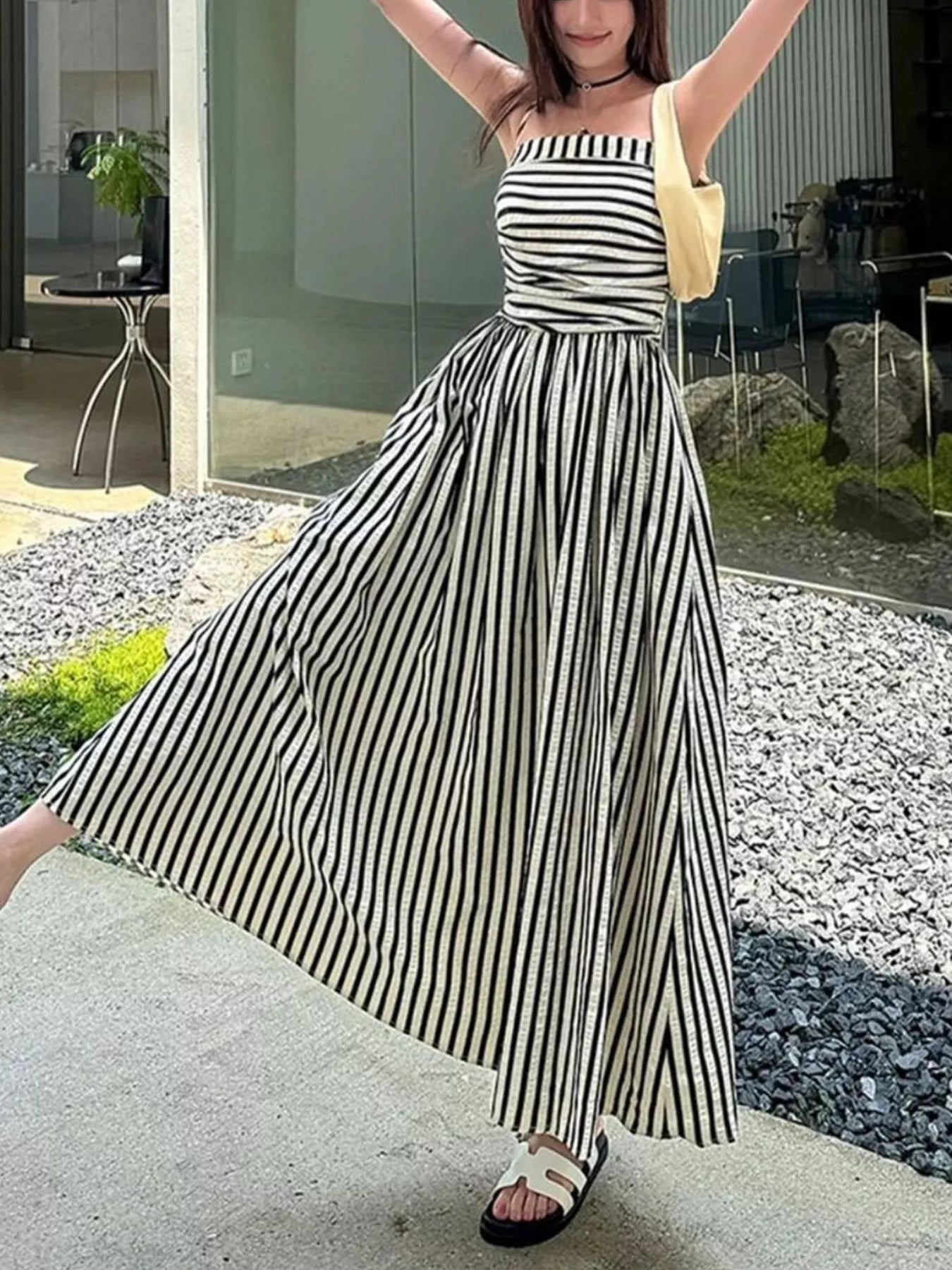 Striped Spaghetti Strap Casual Maxi Dress for Summer Wear, featuring a pocketed design and elegant floor-length style.