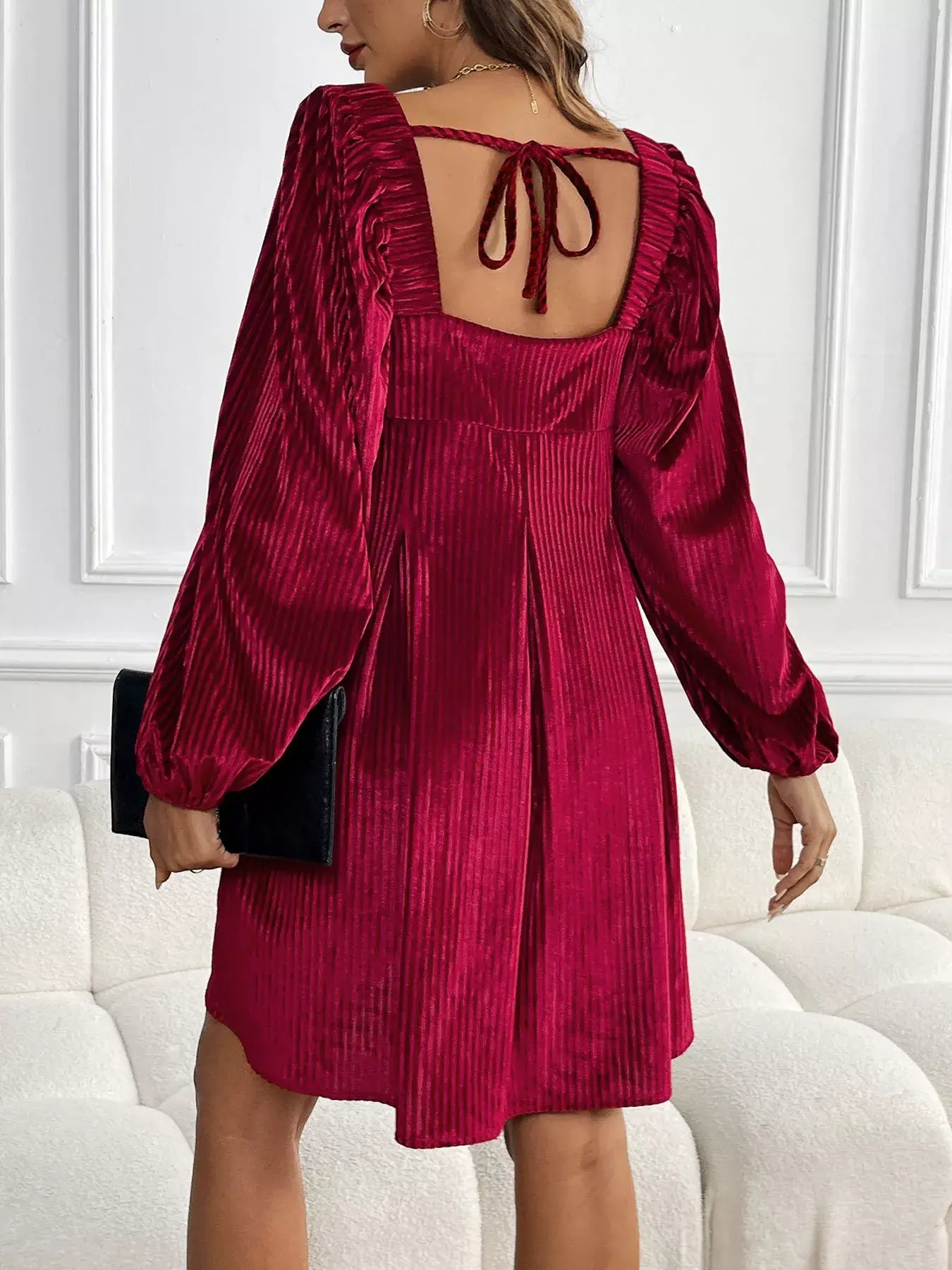 Velvet Square Neck Long Sleeve Dress in rich red hue showcasing ruffled back detail and elegant balloon sleeves.