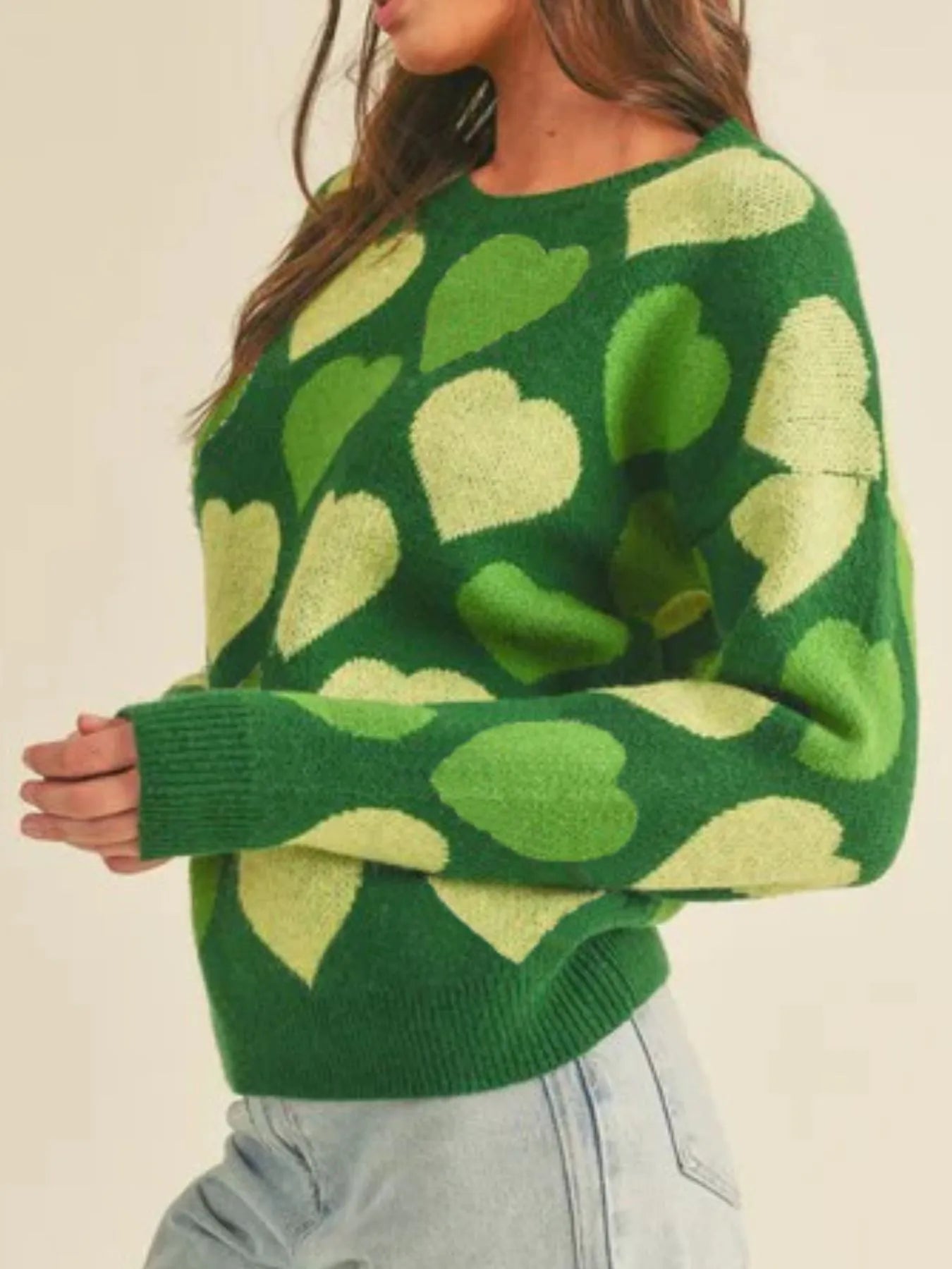 Heart Ribbed Hem Long Sleeve Sweater featuring green and yellow heart patterns on a cozy knit design.