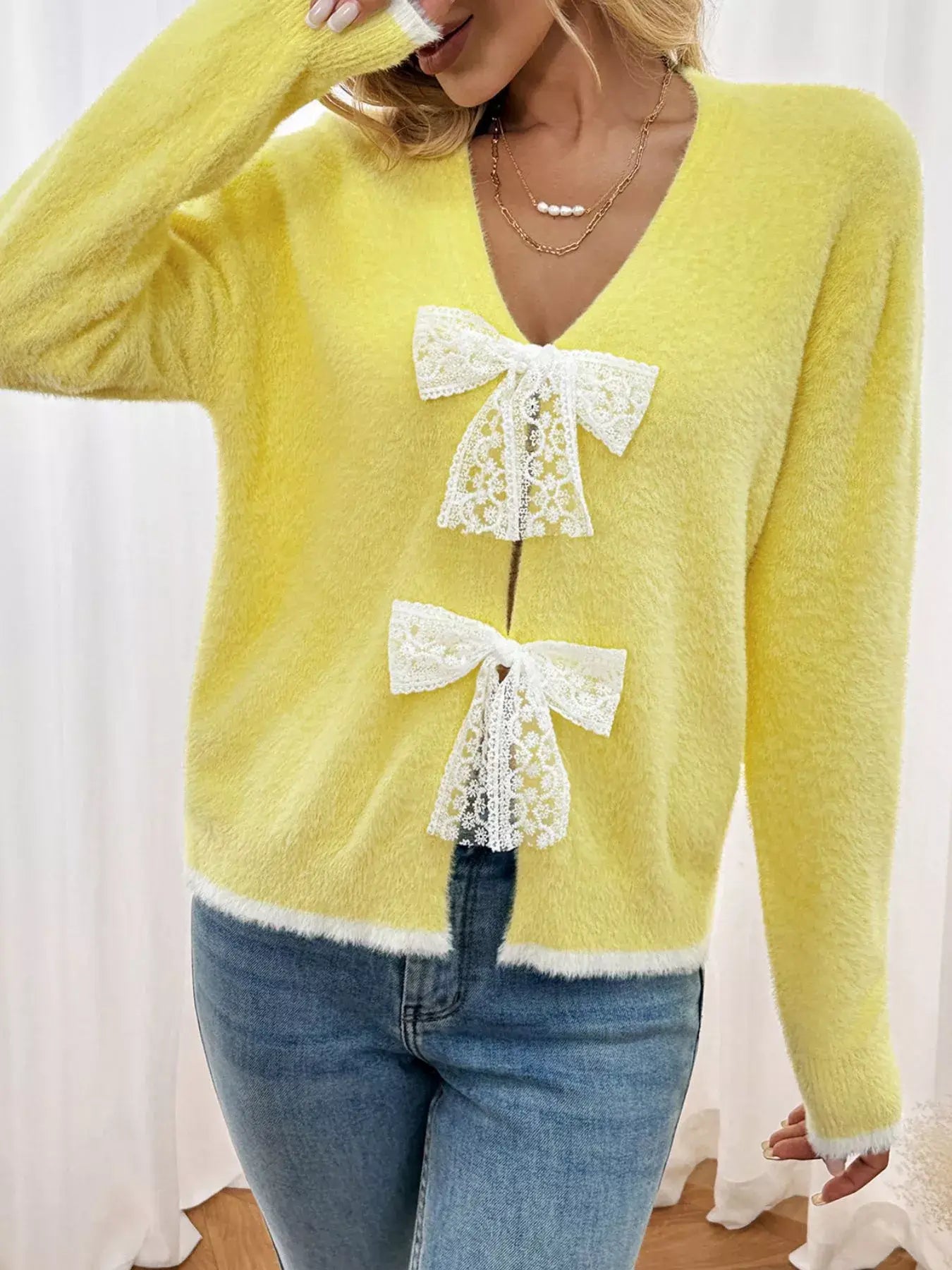 Lace Bow-Tie Front Long Sleeve Cardigan in yellow with lace bow details and long sleeves, styled for a chic look.