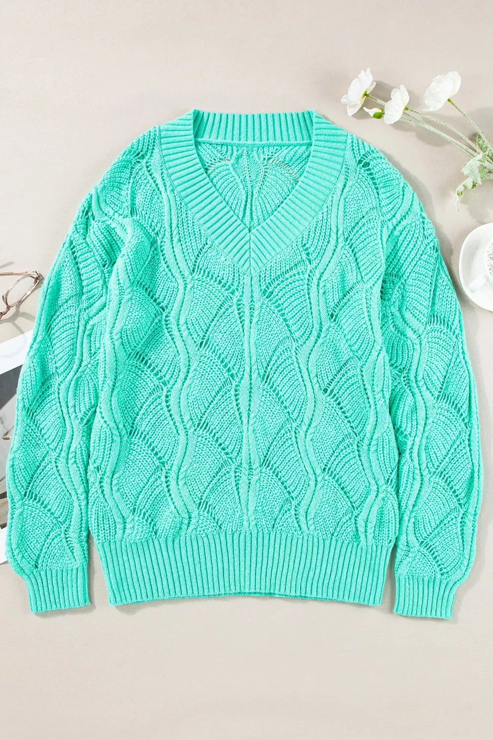 Elegant Texture V-Neck Knit Top – Women’s Cable Knit Sweater in vibrant mint green with cable-knit design.