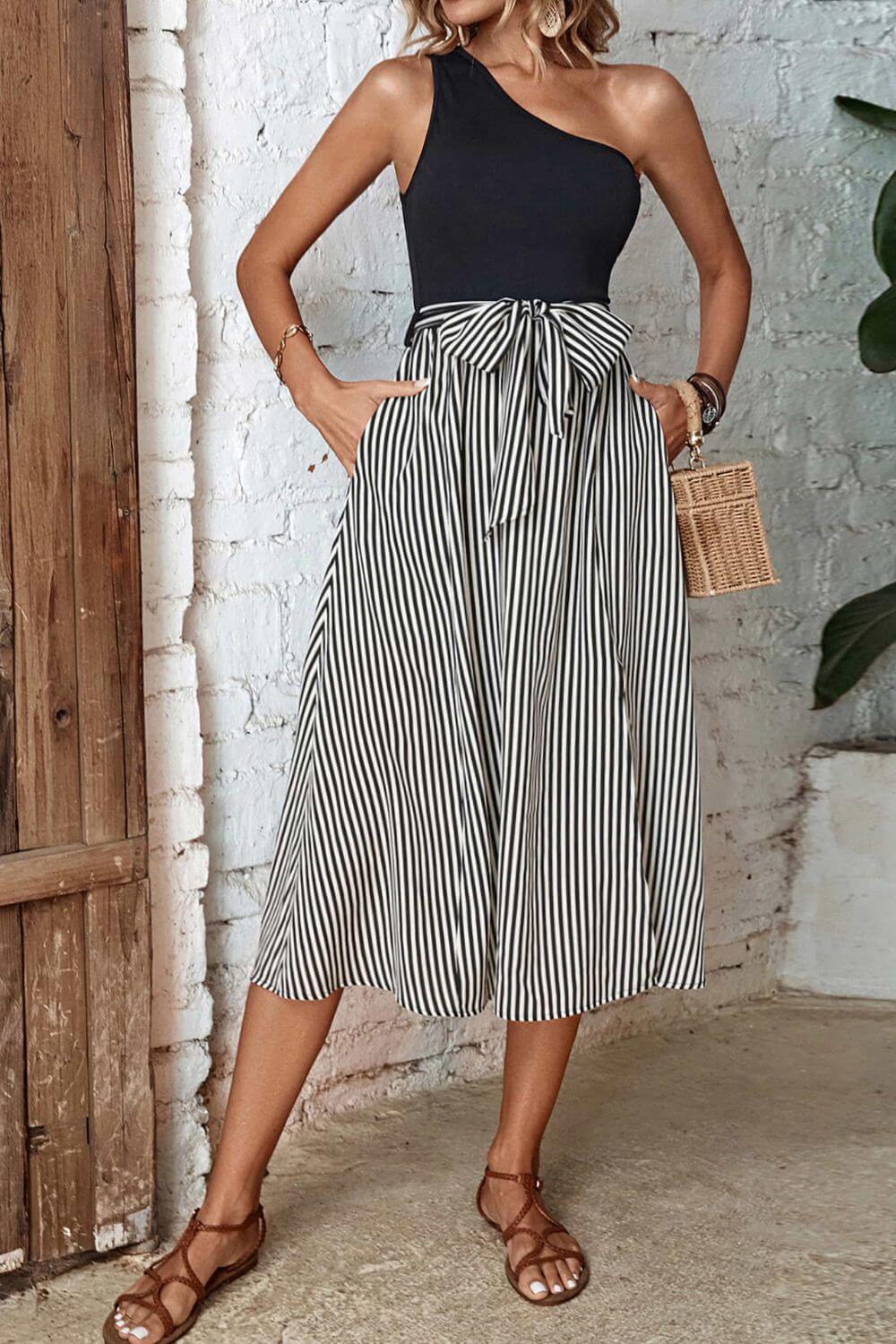 Perfee Striped One-Shoulder Slit Dress featuring a chic striped design and side slit, perfect for casual and special occasions.