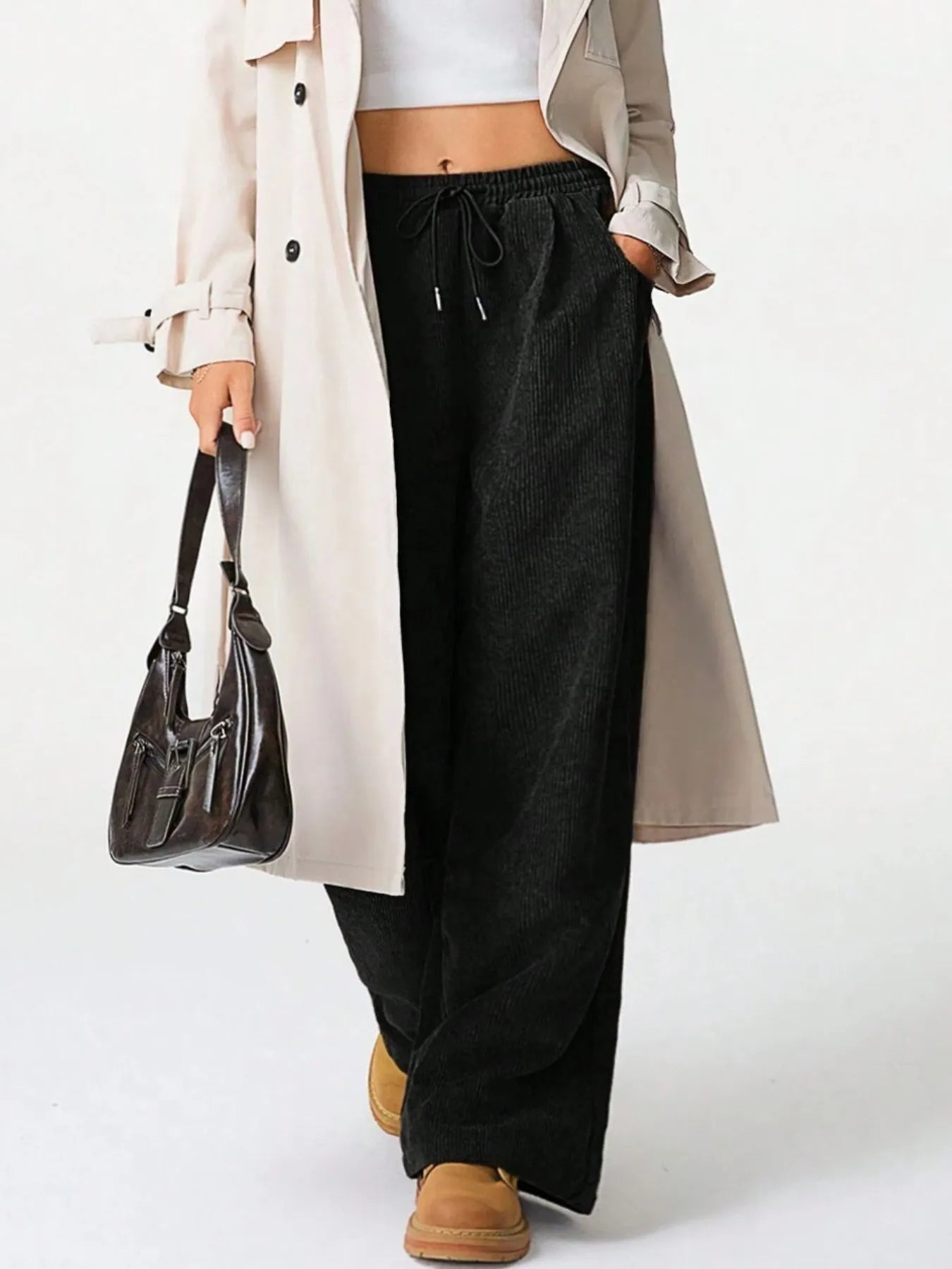 Woman wearing Drawstring Wide Leg Pants with a trench coat, showcasing relaxed everyday comfort and style.