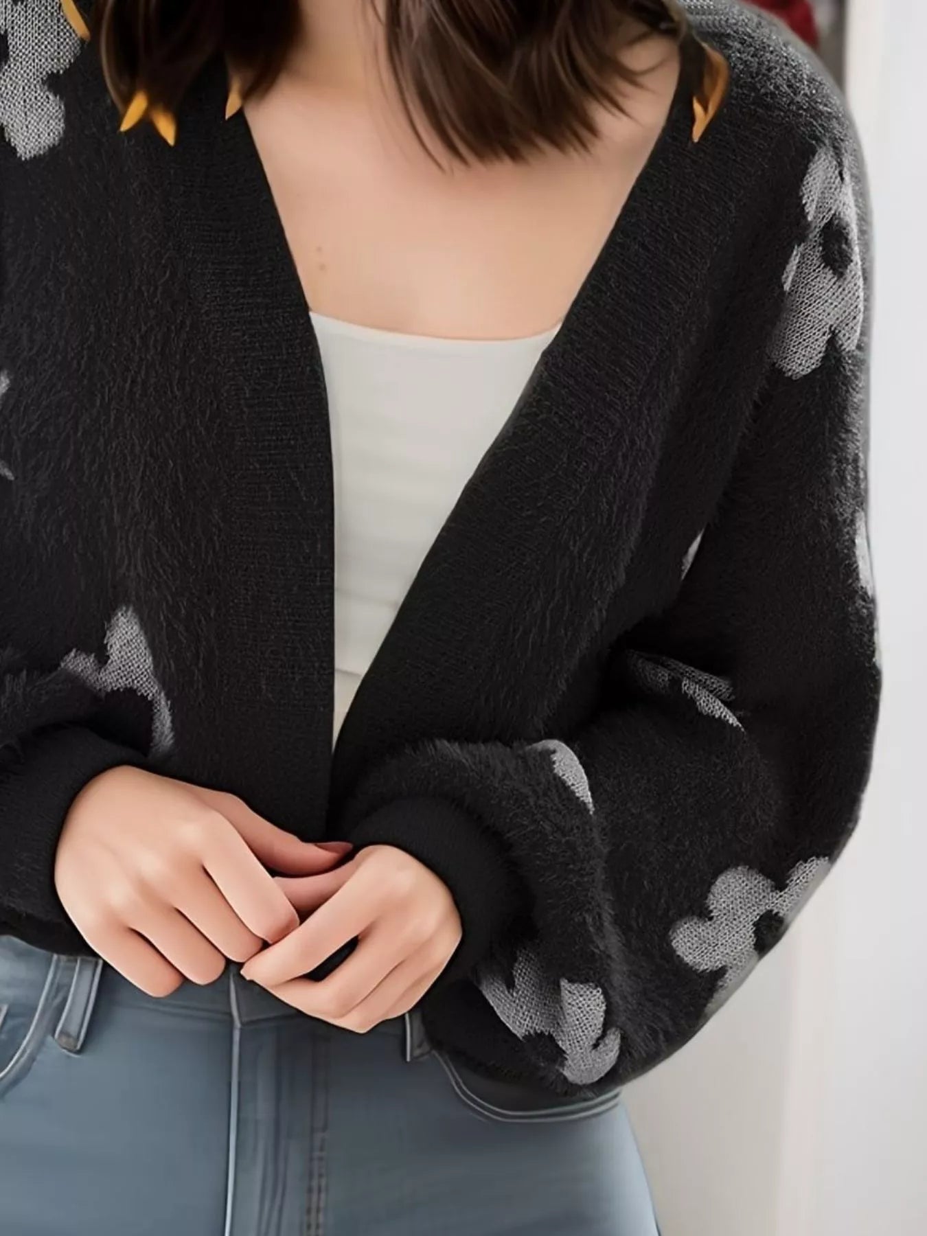 Floral Open Front Cardigan for Women featuring a stylish black design with floral patterns and a slightly stretchy material.