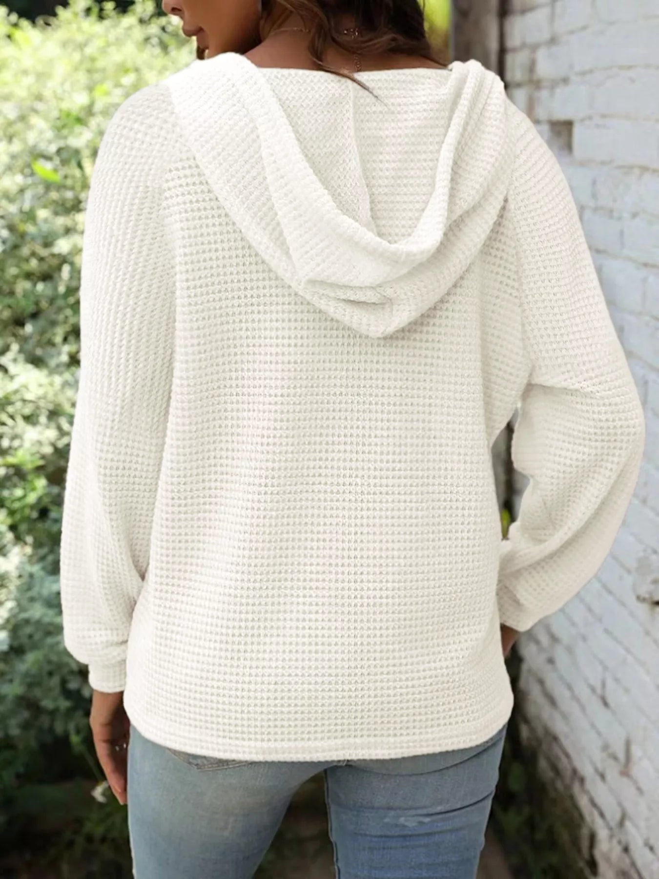 Full Size Button Detail Waffle Knit Hoodie Plus Size shown from the back, featuring a cozy hood and textured waffle knit fabric.