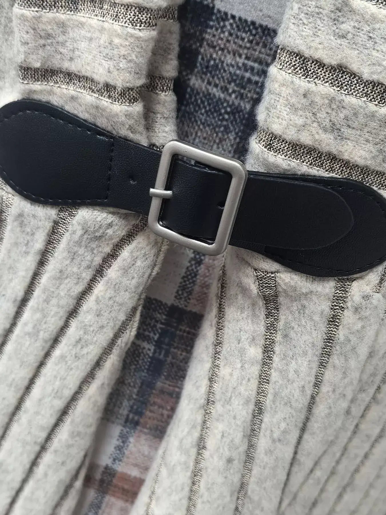 Close-up of the belt detail on Plaid Cami Dress and Ribbed Cardigan Set showcasing stylish texture and design.