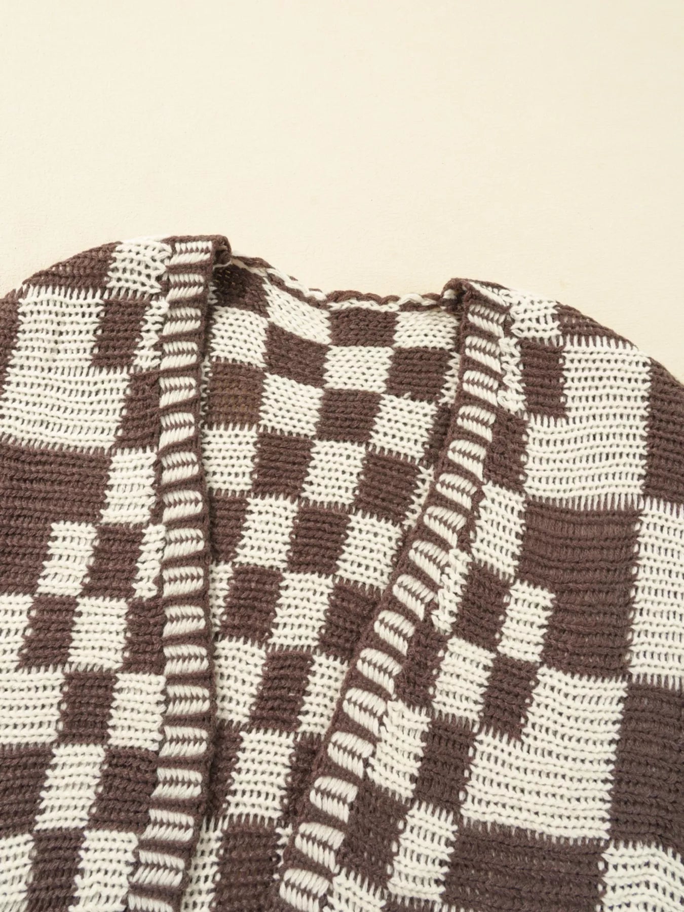 Checkerboard Pattern Sweater Cardigan in brown and cream hues with a cozy knit design, perfect for layering.