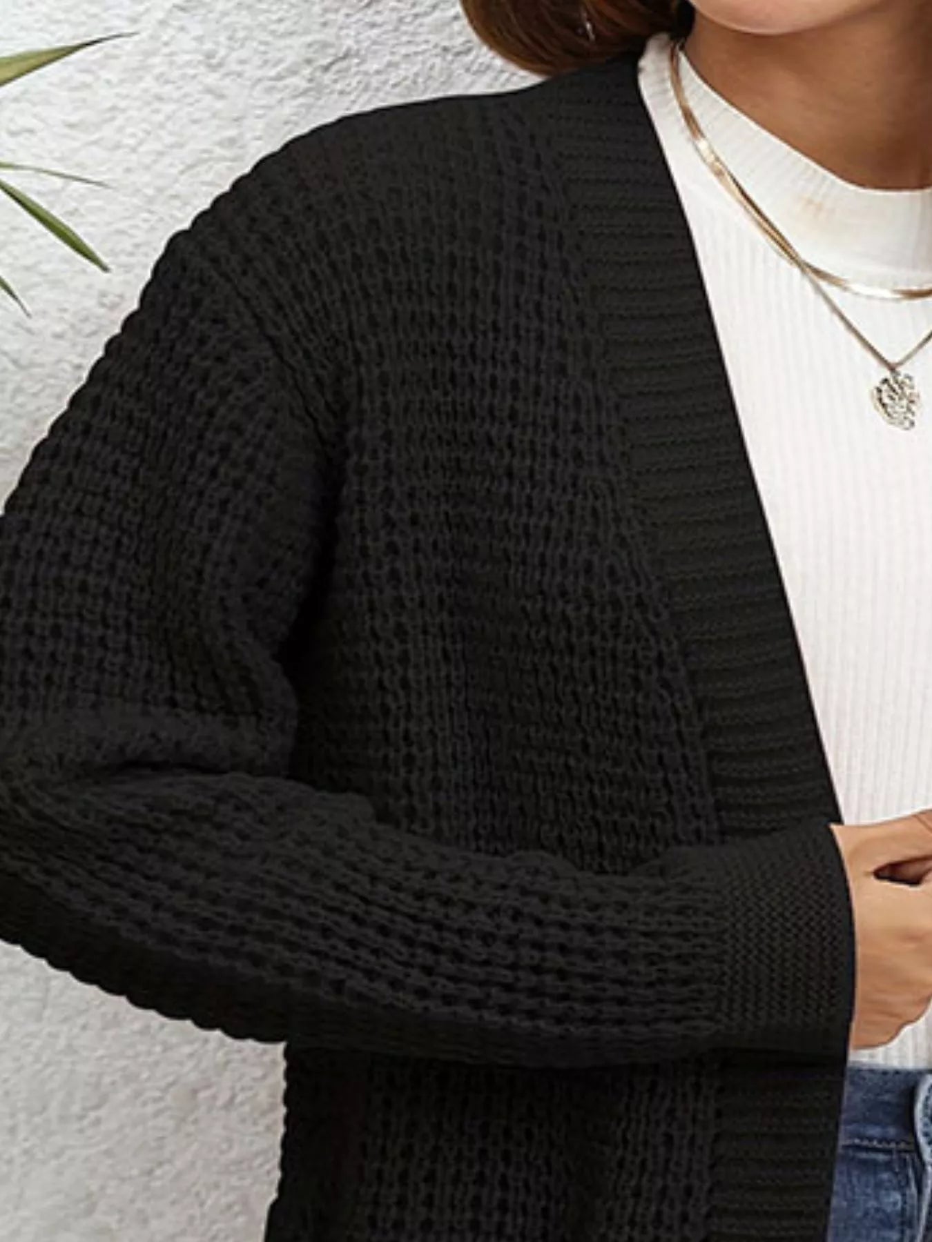 Close-up of a Chunky Knit Open Front Cardigan in black, featuring a textured knit design for cozy layered style.