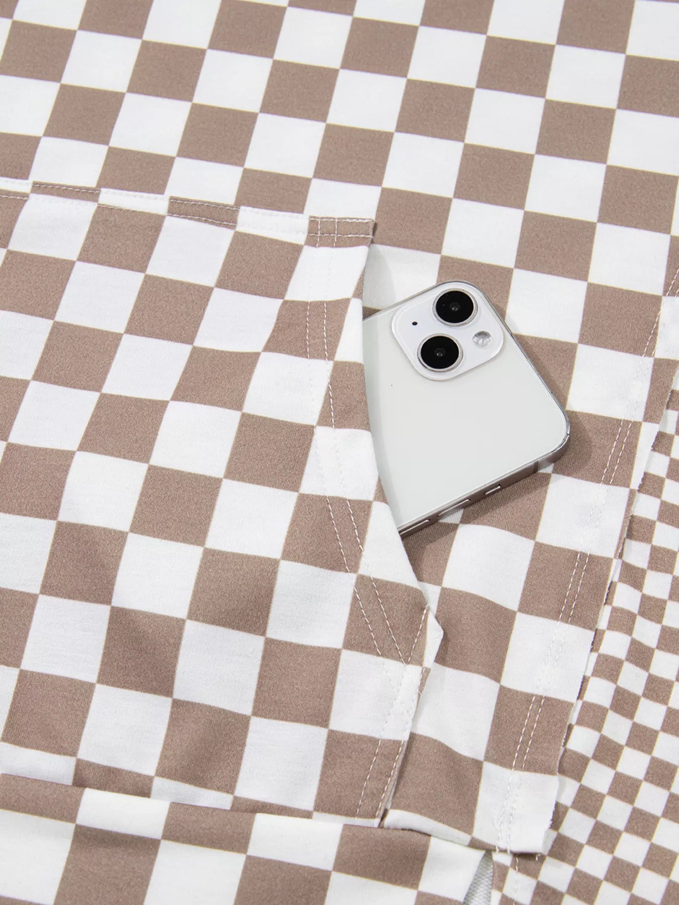 Checkered Pattern Oversized Drawstring Hoodie showing a phone in the pocket, designed for casual wear.