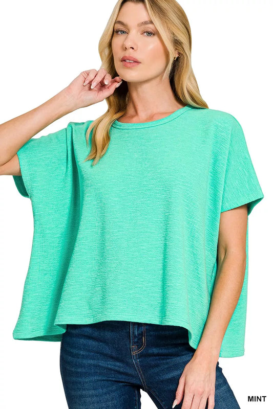 Cotton Slub Oversized Tee in mint color, showcasing its relaxed fit and soft fabric, perfect for everyday style.