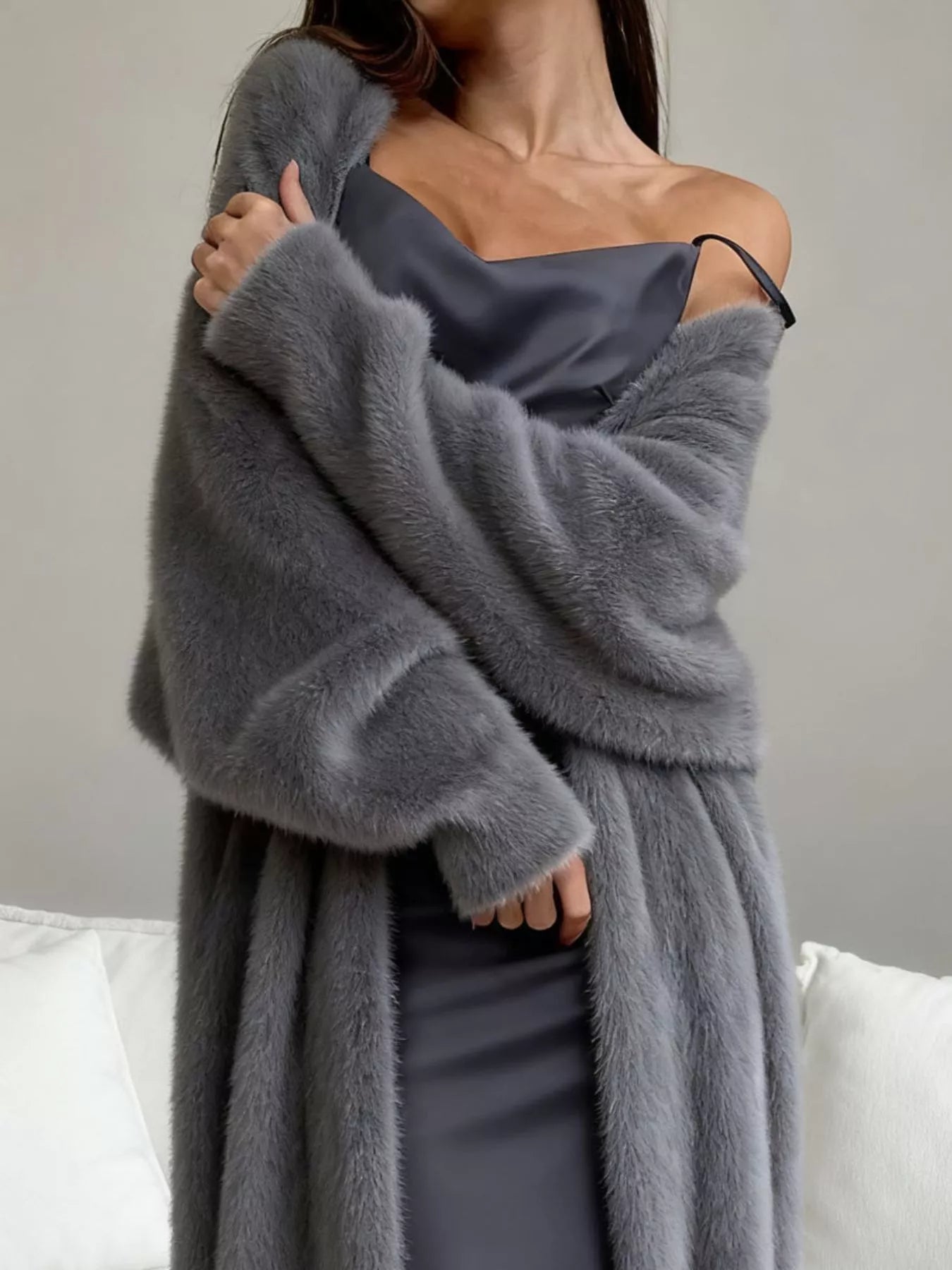 Fuzzy Open Front Longline Cardigan cozy women in gray soft layer over a silky dress, showcasing warmth and style.