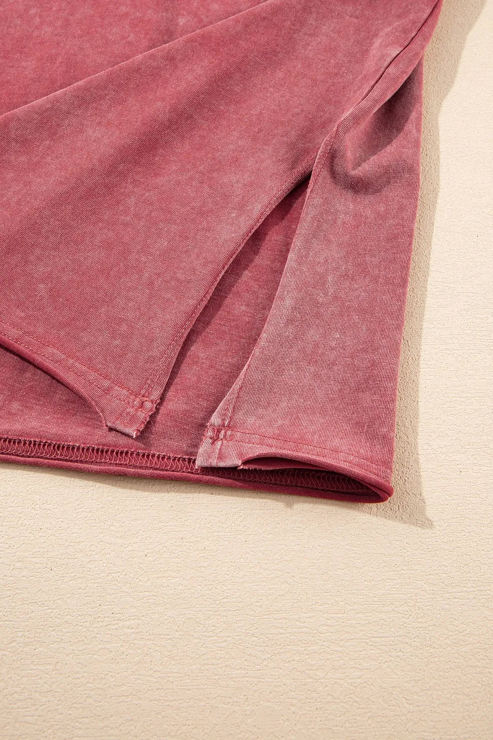 One Shoulder Half Sleeve Oversized Tunic T Shirt showing distressed fabric and cutout detail in a close-up view.