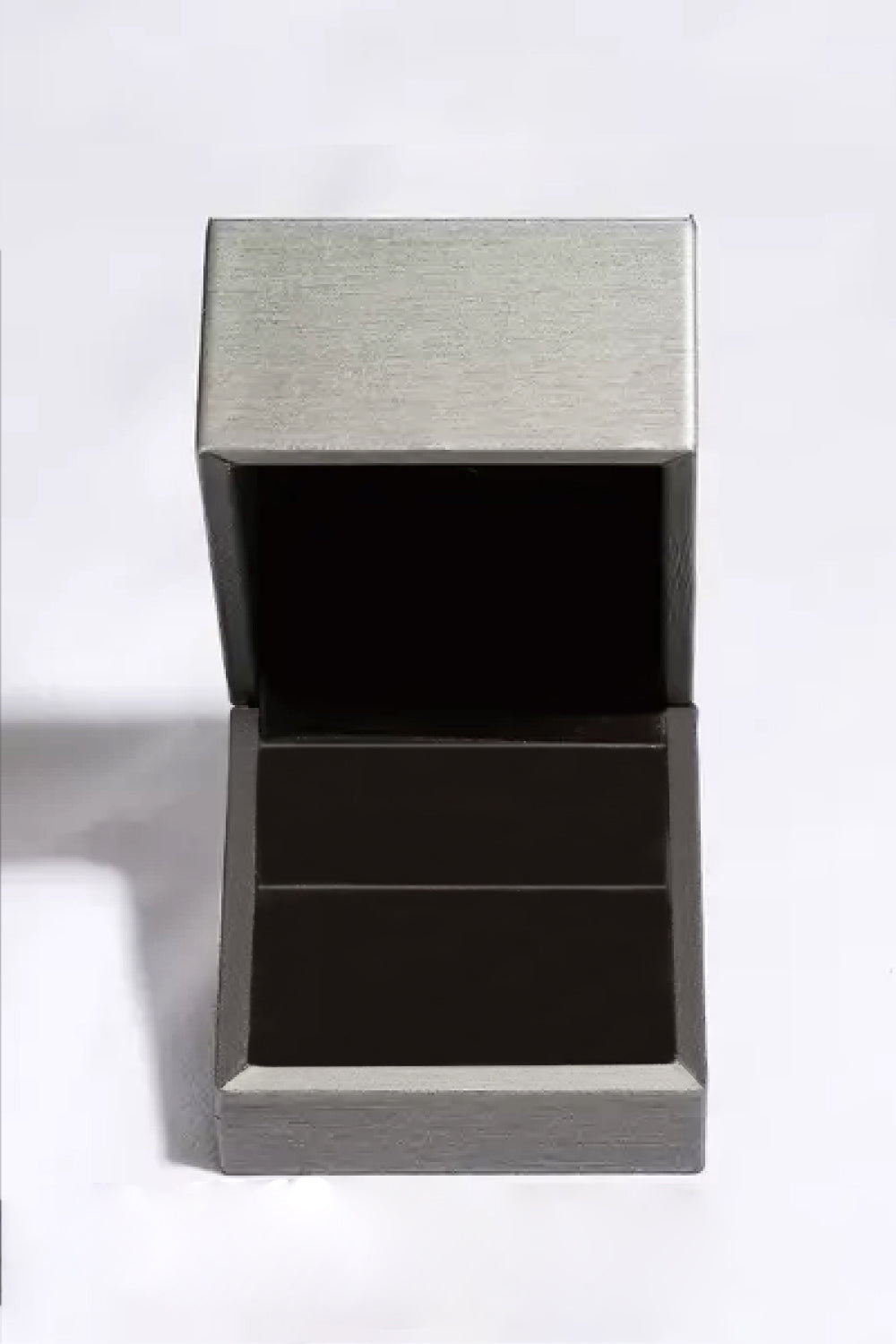 Open jewelry box for storing 2 Carat Moissanite Square Stud Earrings, showcasing modern design and elegant storage.