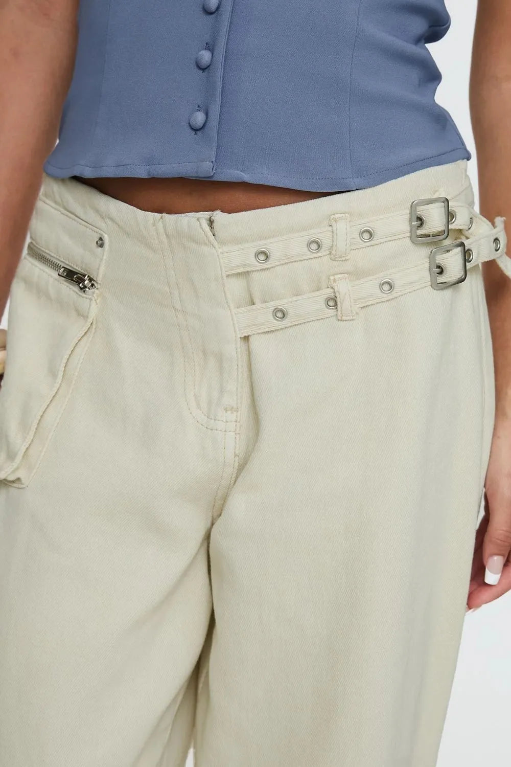 Wide Leg Jeans with Pockets featuring stylish buckle details and functional pockets for casual wear.