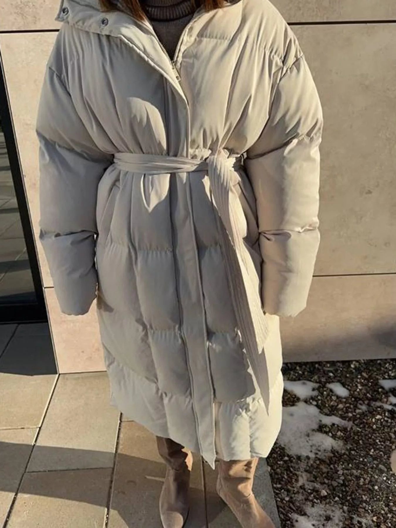 Longline Padded Winter Coat Belted warm women jacket with pockets and zipper in light color, perfect for winter fashion.