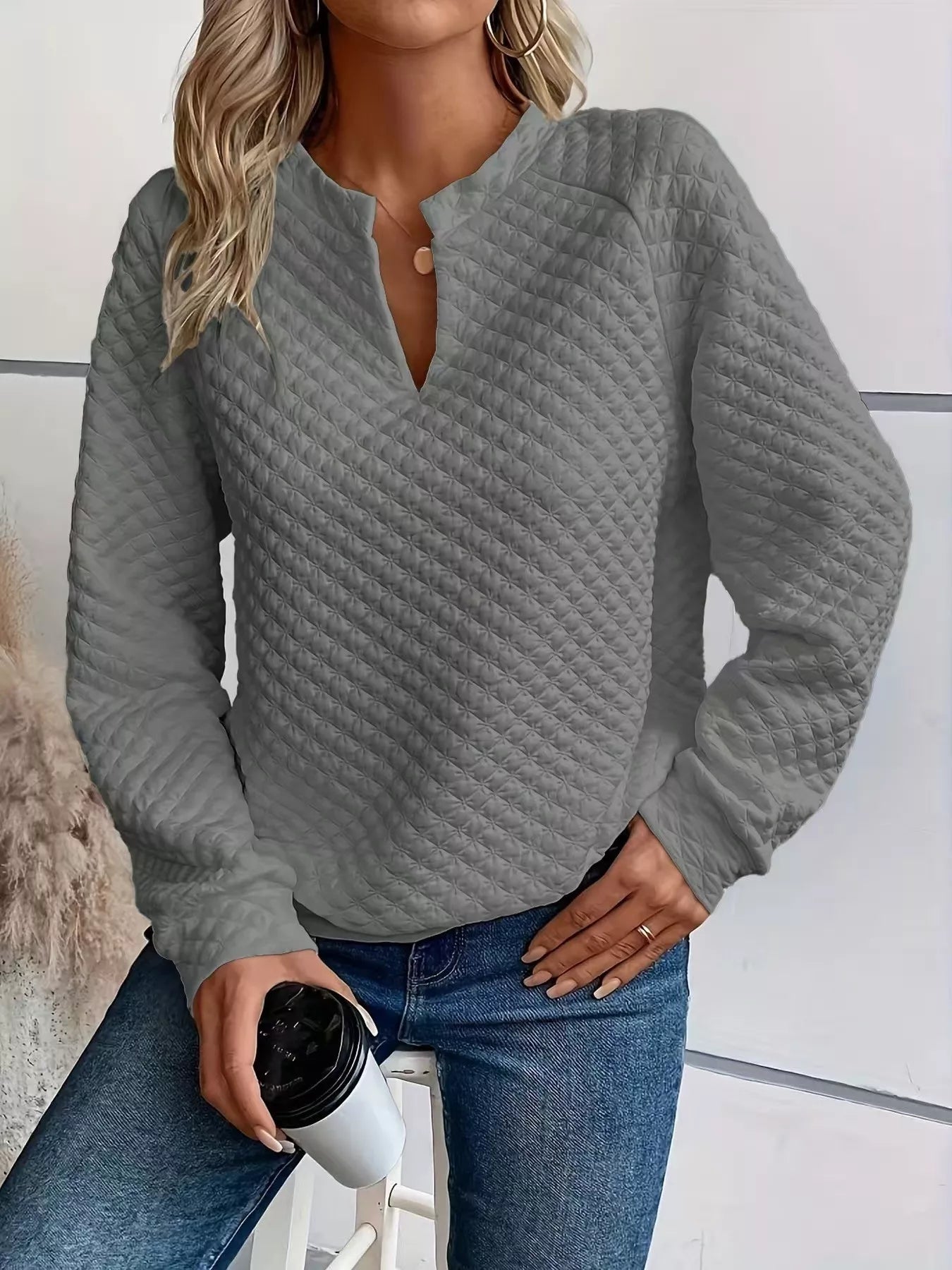 Quilted Texture Long Sleeve Sweatshirt with Notched Neck, gray color, worn casually with a coffee cup.