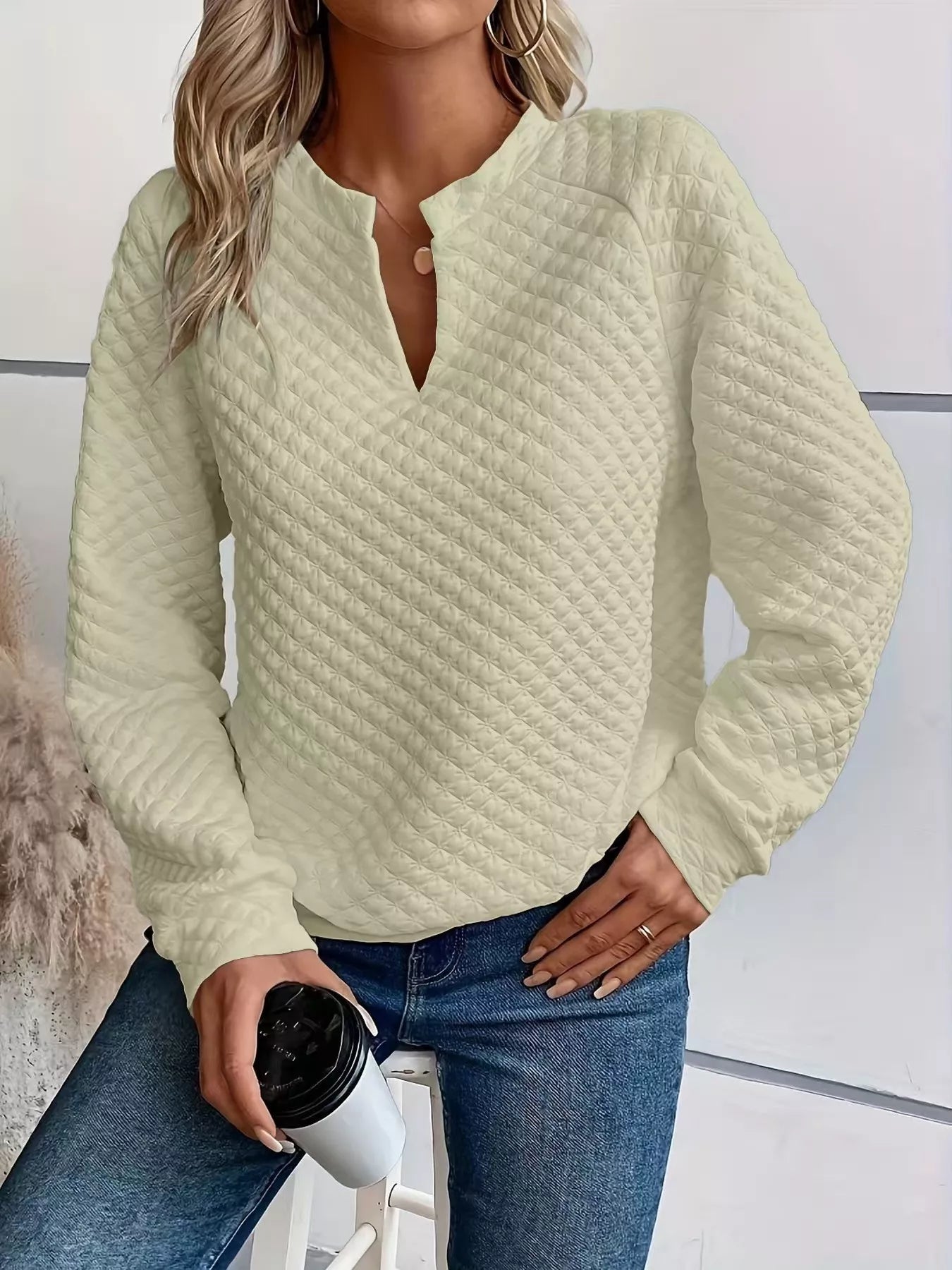 Quilted Texture Long Sleeve Sweatshirt with Notched Neck, featuring a cozy fit and textured design in a light color.