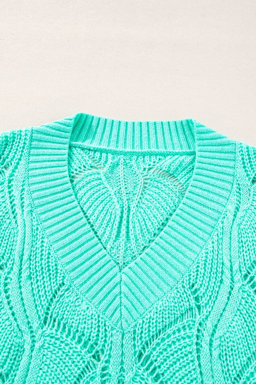 Elegant Texture V-Neck Knit Top – Women’s Cable Knit Sweater in mint green with detailed cable knit design.
