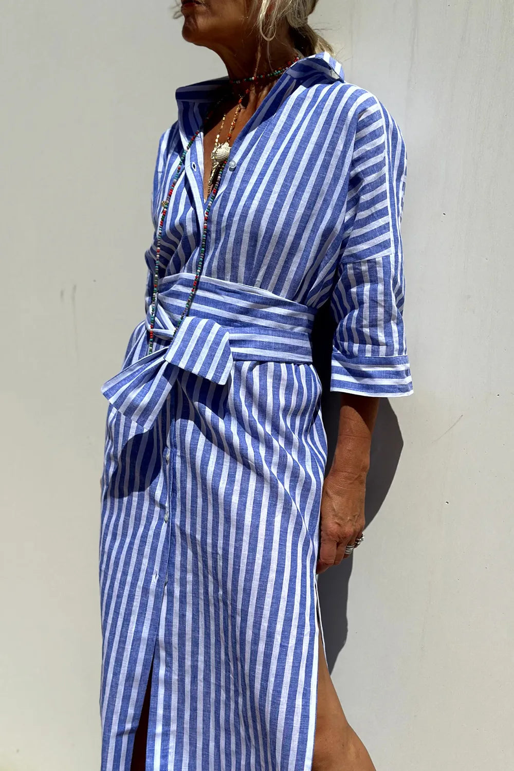 Tied Button Up Three-Quarter Sleeve Dress for Women in blue and white stripes, featuring a tied waist and buttoned front.