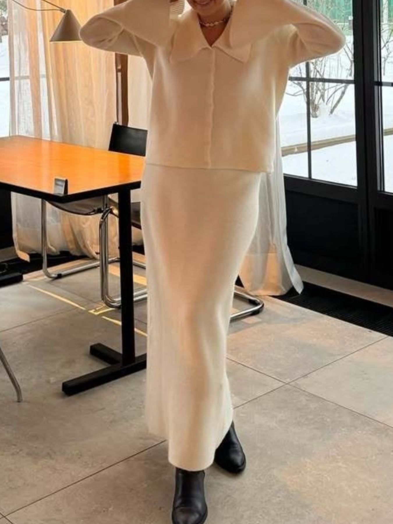 Button Down Cardigan and Skirt Knit Set – Women's Two Piece Outfit in cream color with a buttoned cardigan and a long skirt.