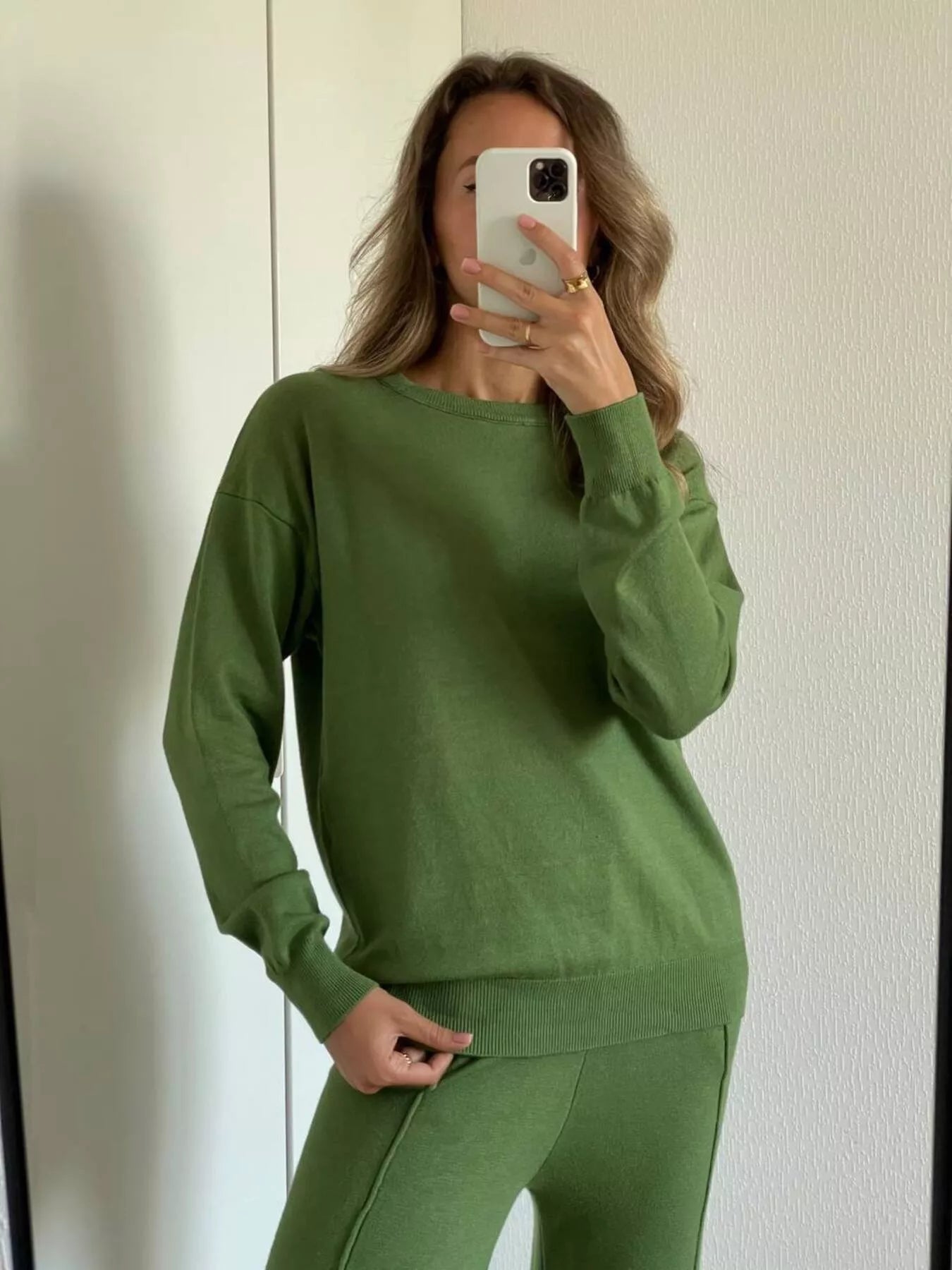 Cozy women’s lounge outfit featuring a Long Sleeve Top and Pants Sweater Set in green, showcasing basic style and slightly stretchy material.