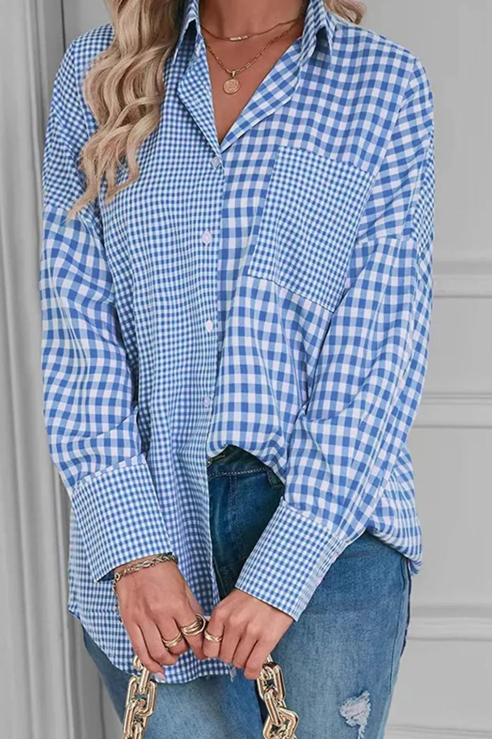 Plaid Button Up Long Sleeve Shirt in blue checkered pattern with pocket, styled for casual wear.