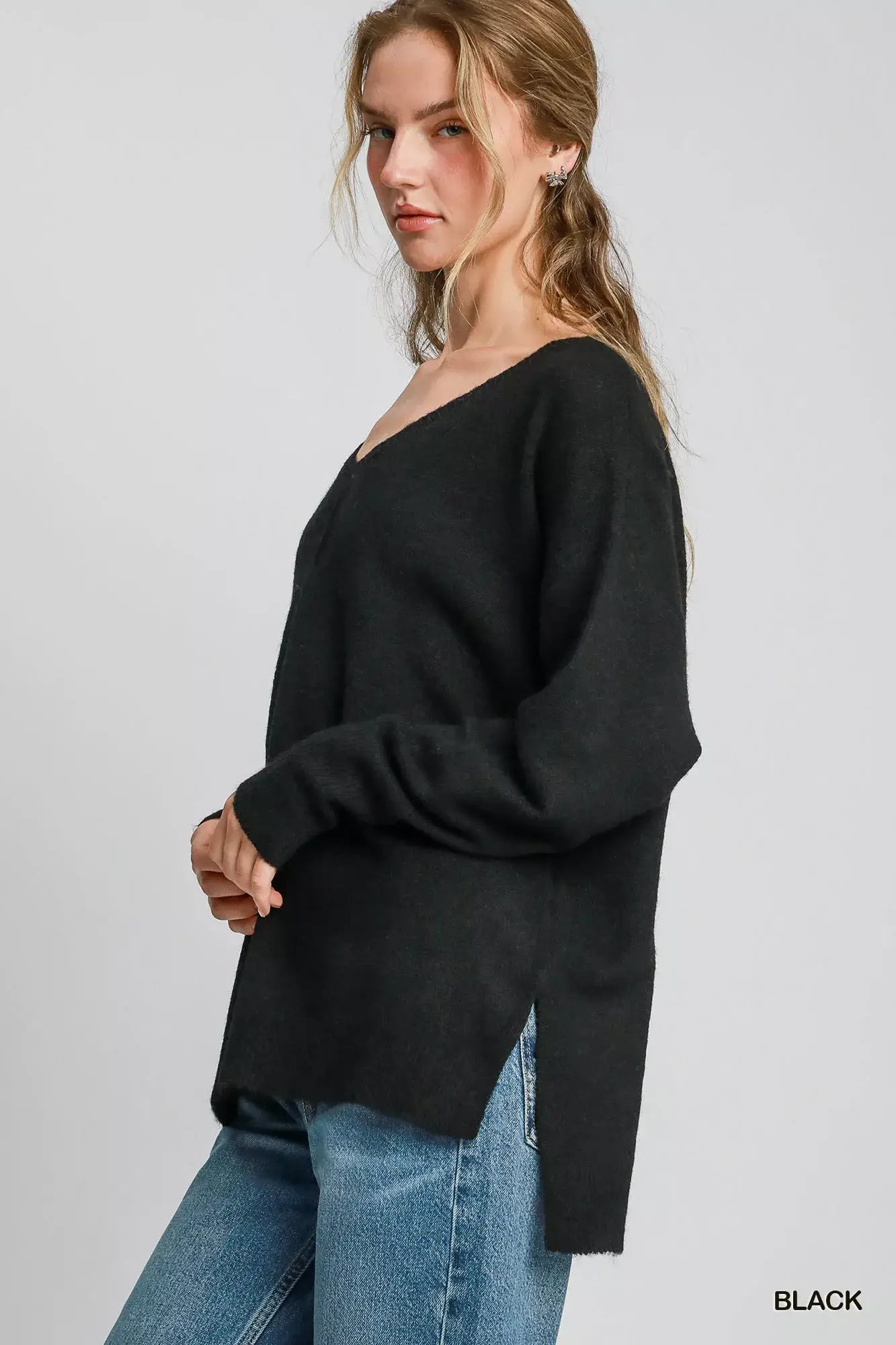 Umgee Wool Blended Pullover Sweater in black, showcasing a relaxed fit and V-neckline for winter elegance.