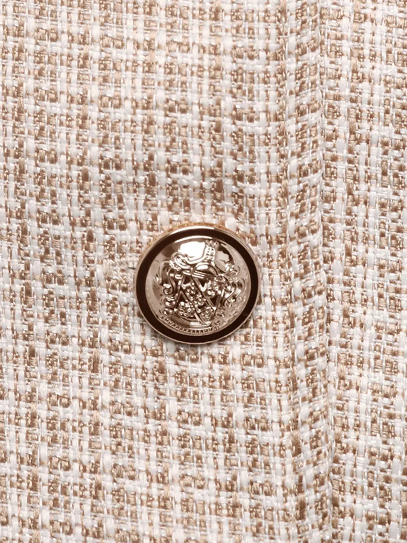 Close-up of the button on the Button Up Long Sleeve Jacket with Pockets for Women, featuring a chic design.