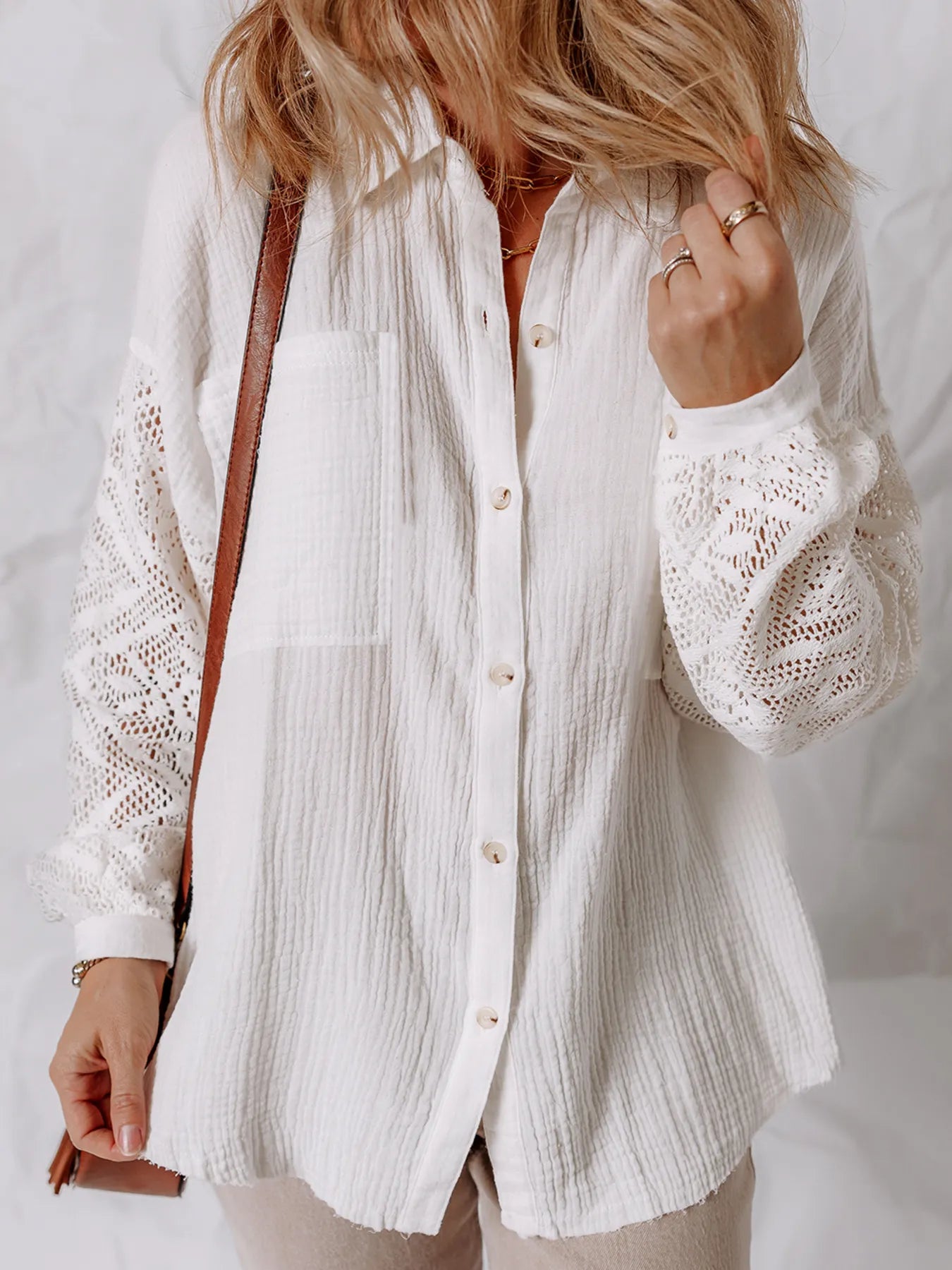 Lace Sleeve Button Down Shirt featuring pocketed design and elegant eyelet detail for stylish wear.