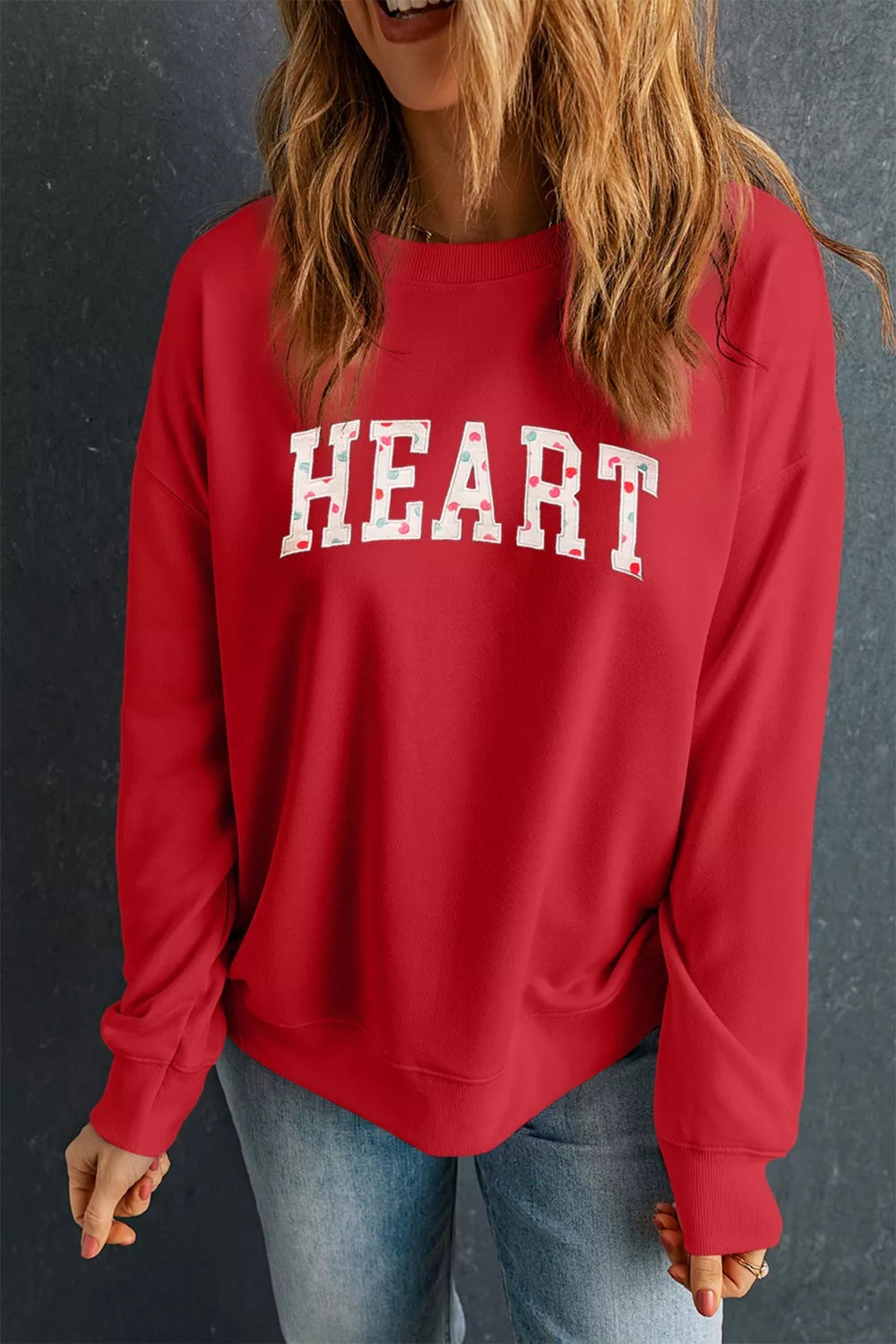Heart Embroidered Patched Graphic Valentine Sweatshirt in red with 'HEART' lettering, perfect for Valentine's Day apparel.