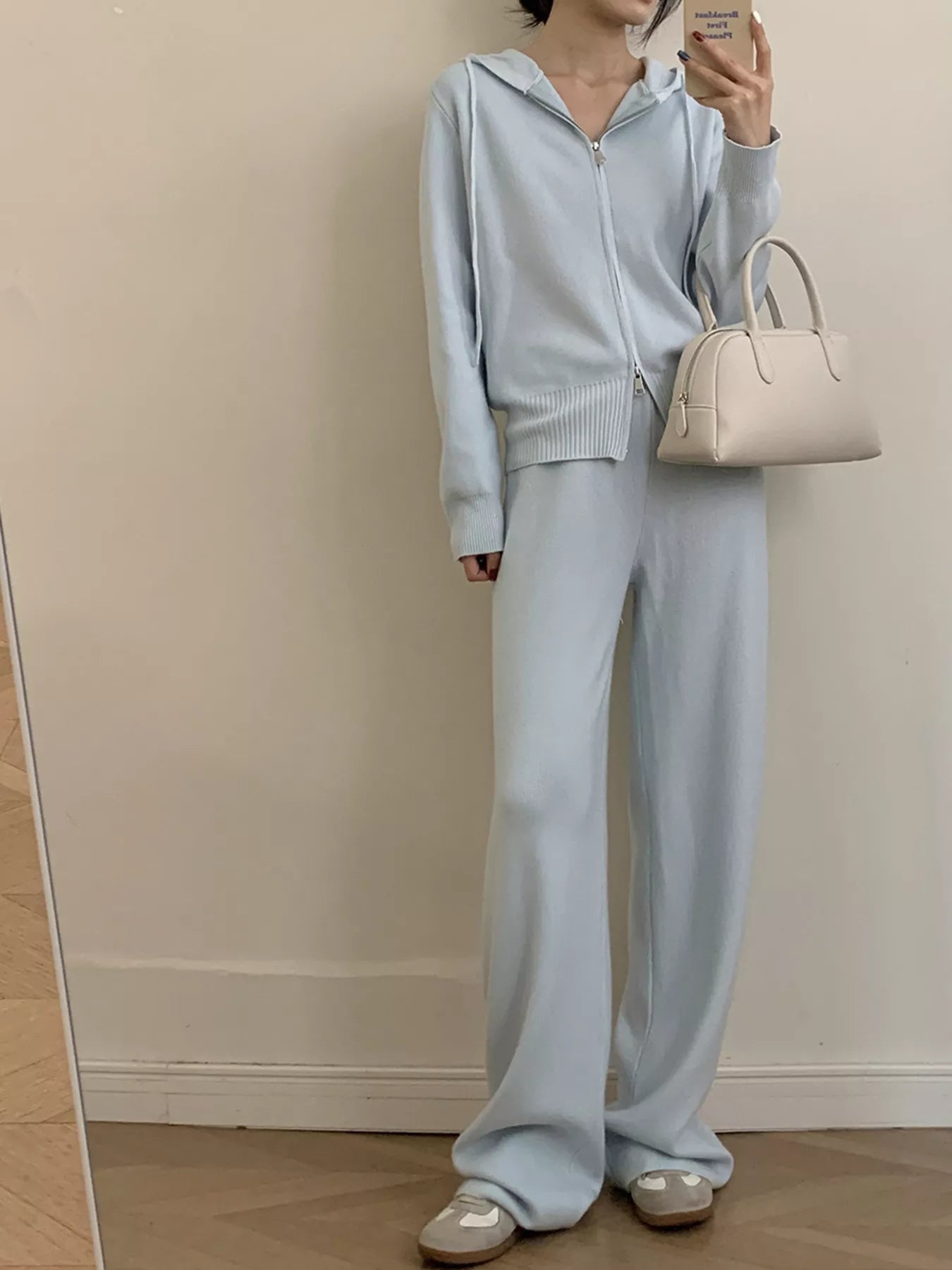 Zip Up Cardigan and Wide Leg Pants Knit Set - Women's Two Piece Outfit in light blue with a zipper and drawstring.