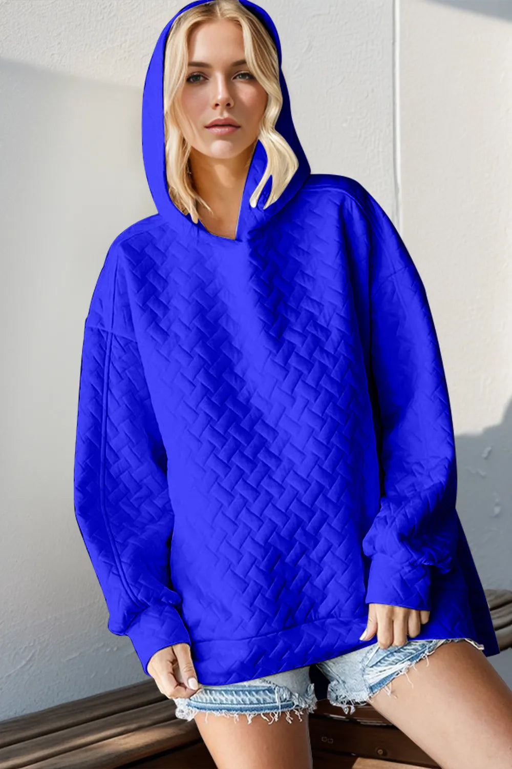 Texture Drop Shoulder Long Sleeve Hoodie in vibrant blue, featuring a cozy, quilted design for everyday comfort.
