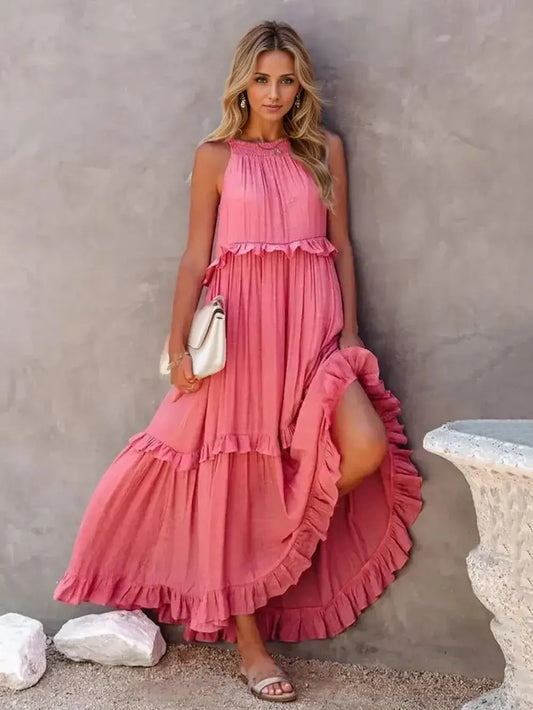 Ruffled Sleeveless Tiered Maxi Dress with Pockets in pink, featuring ruffles and pockets for style and comfort.
