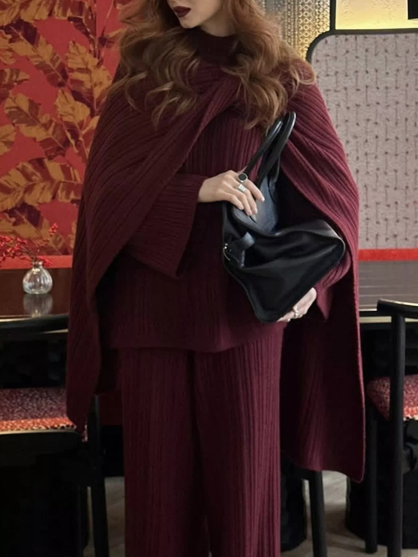 3 Piece Ribbed Sweater and Wide Leg Pants Set with Scarf modeled by a woman in a stylish setting.