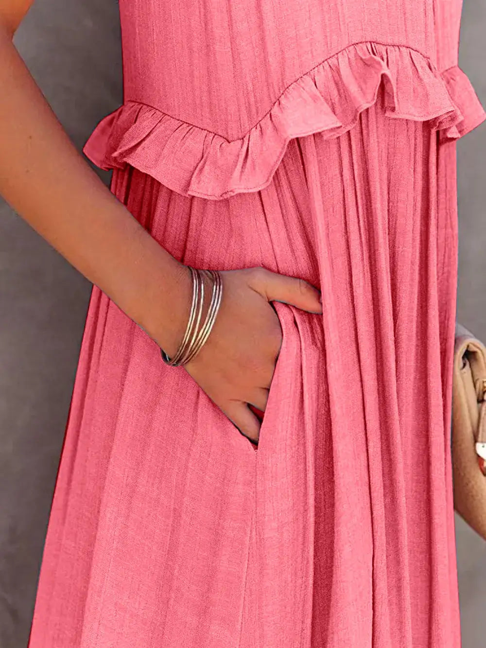Ruffled Sleeveless Tiered Maxi Dress with Pockets showcasing ruffles and pockets in a pink color.